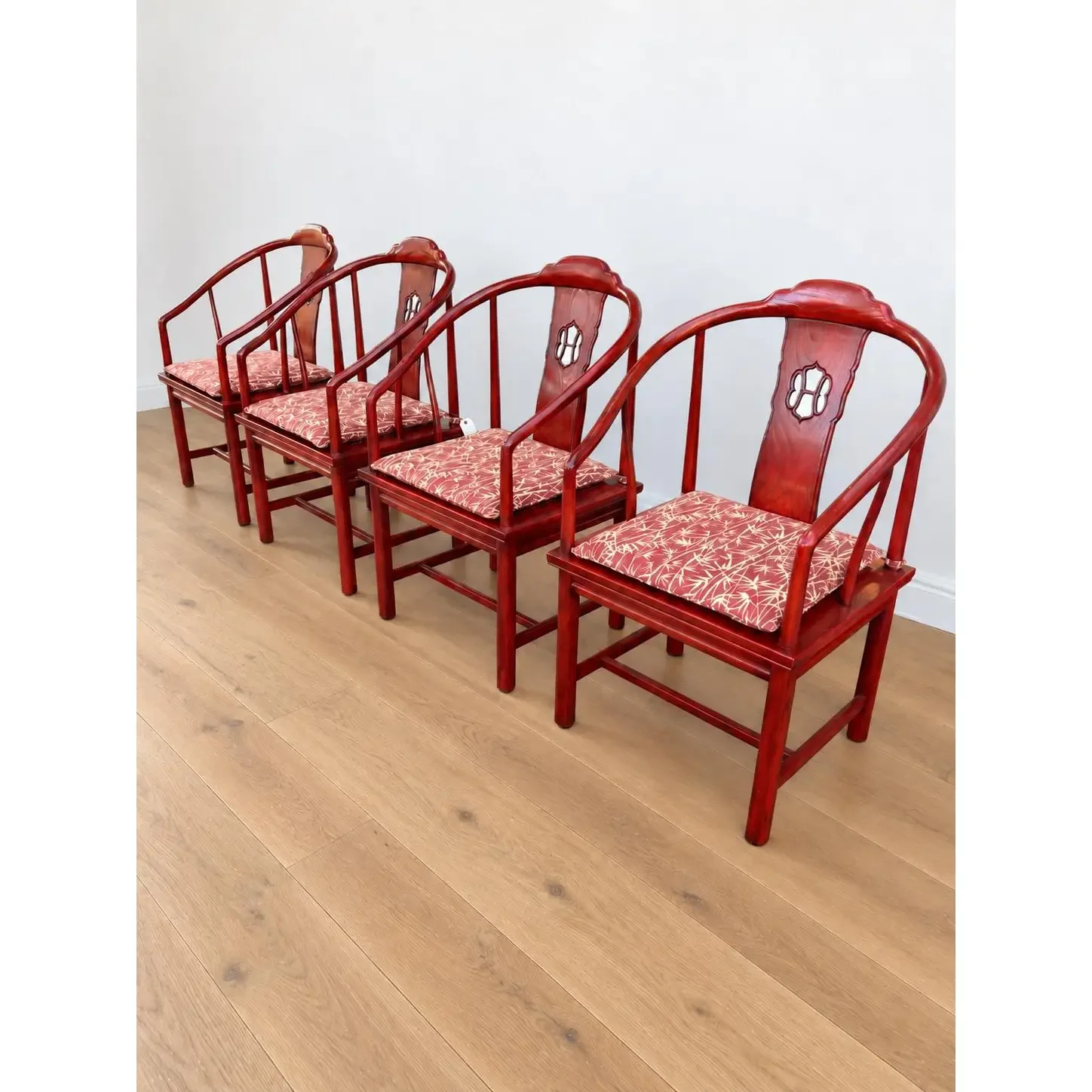 vintage-chinese-horseshoe-back-arm-chairs-with-palm-pattern-seat-cushions-set-of-4-4874.webp