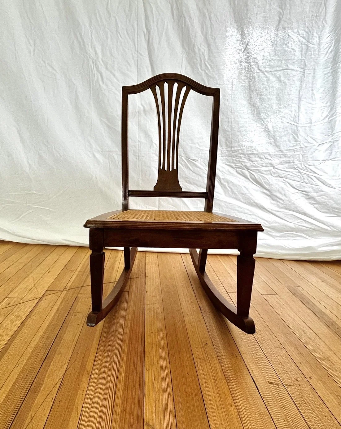vintage-cane-seat-rocking-chair-british-colonial-front.jpg