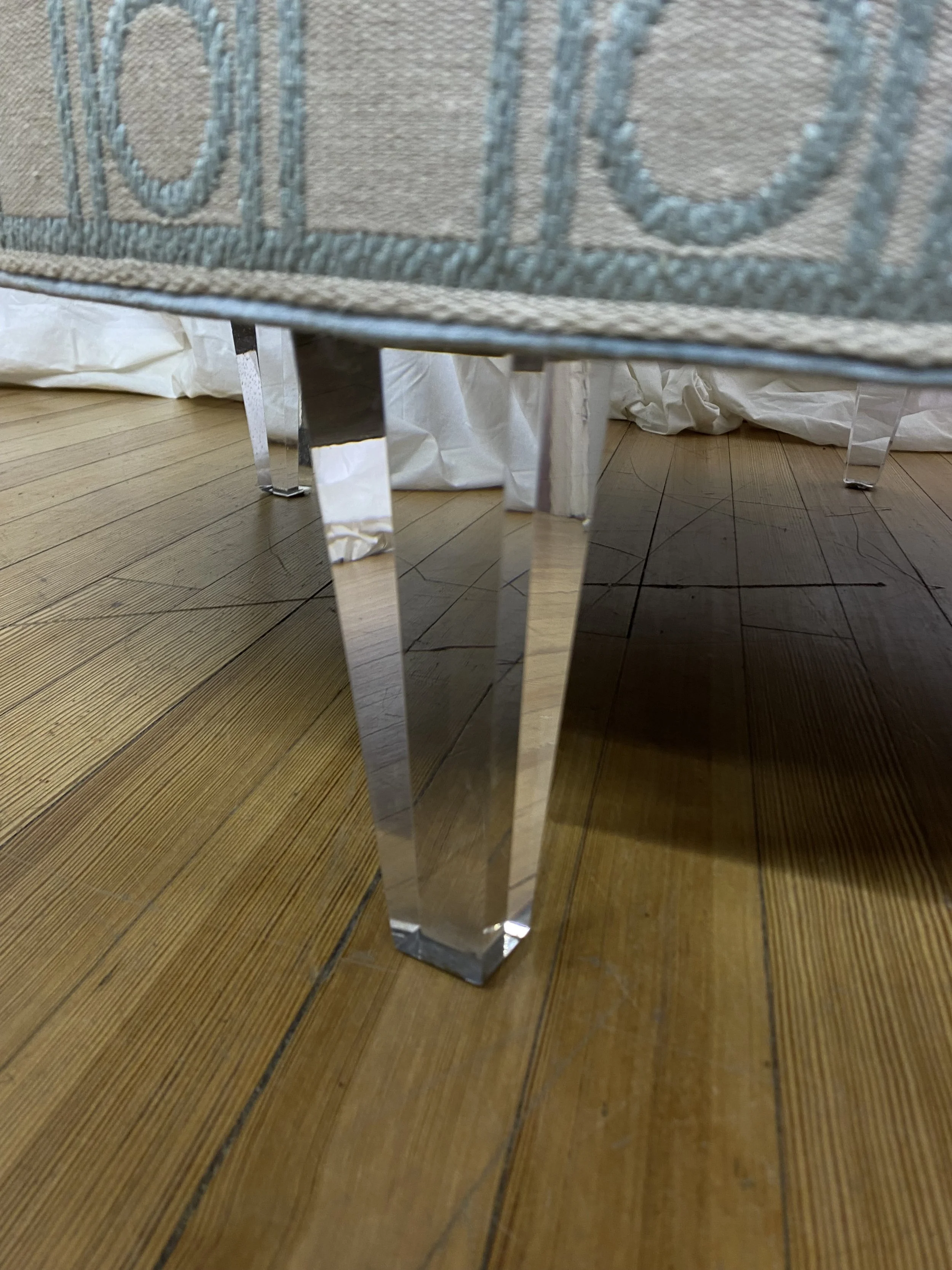 kravet-upholstered-coffee-table-lucite-legs (1).jpg