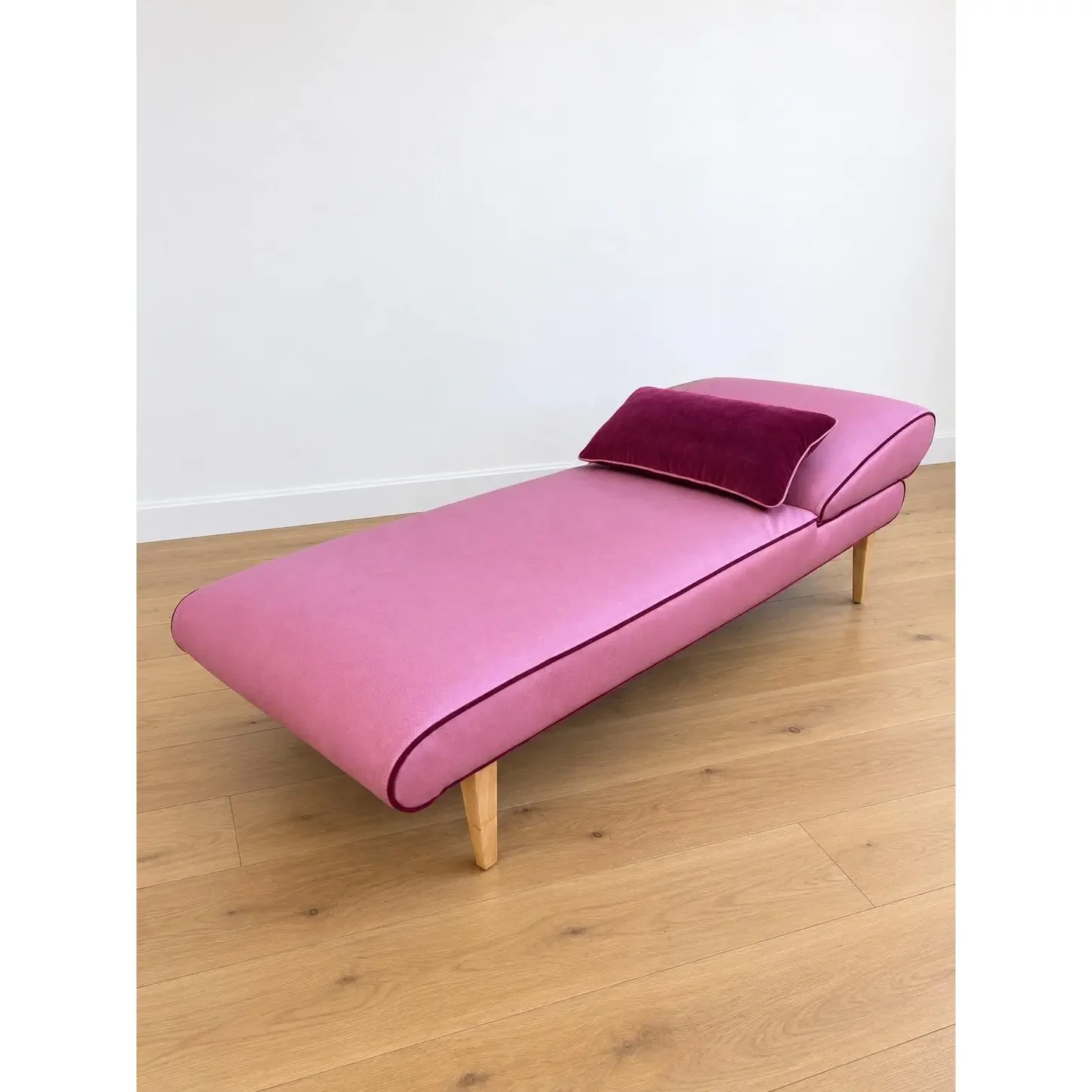 mid-century-modern-chaise-with-adjustable-head-rest-freshly-reupholstered-in-pink-leather-accented-with-cherry-mohair-welting-9244.webp
