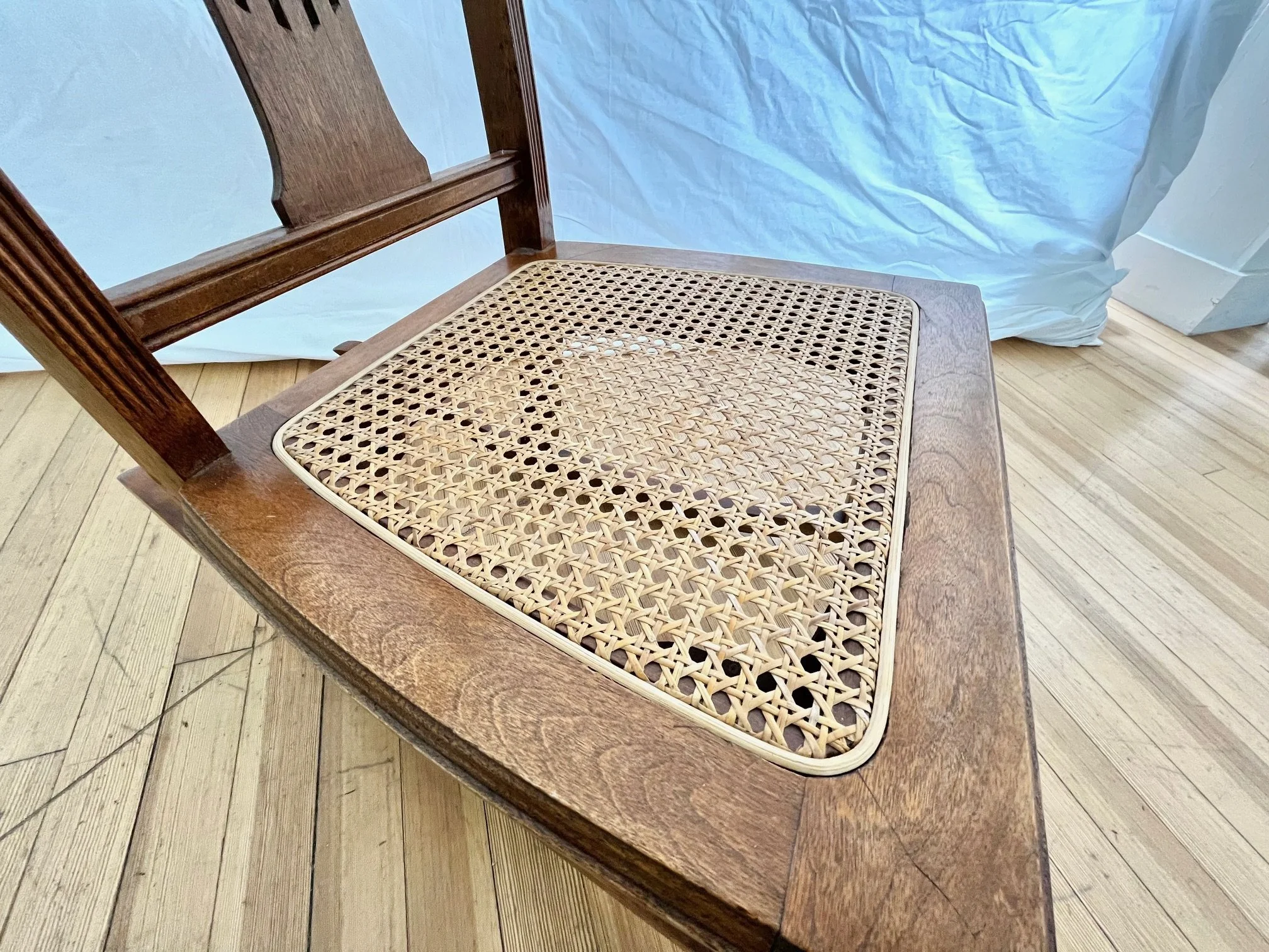 vintage-cane-seat-rocking-chair-seat-view.jpg