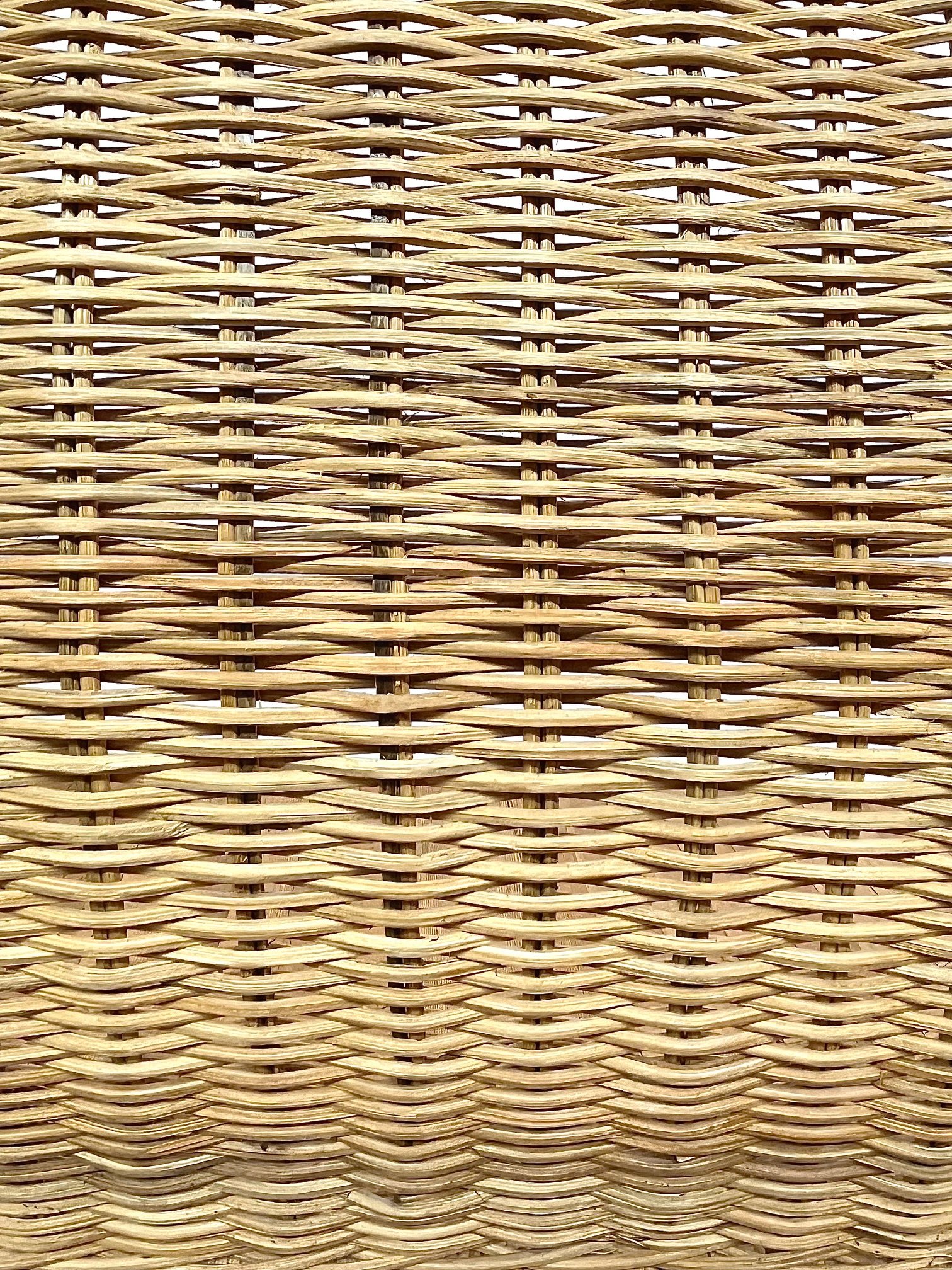 woven-rattan-armchairs-black-metal-frame-weave-closeup.jpg