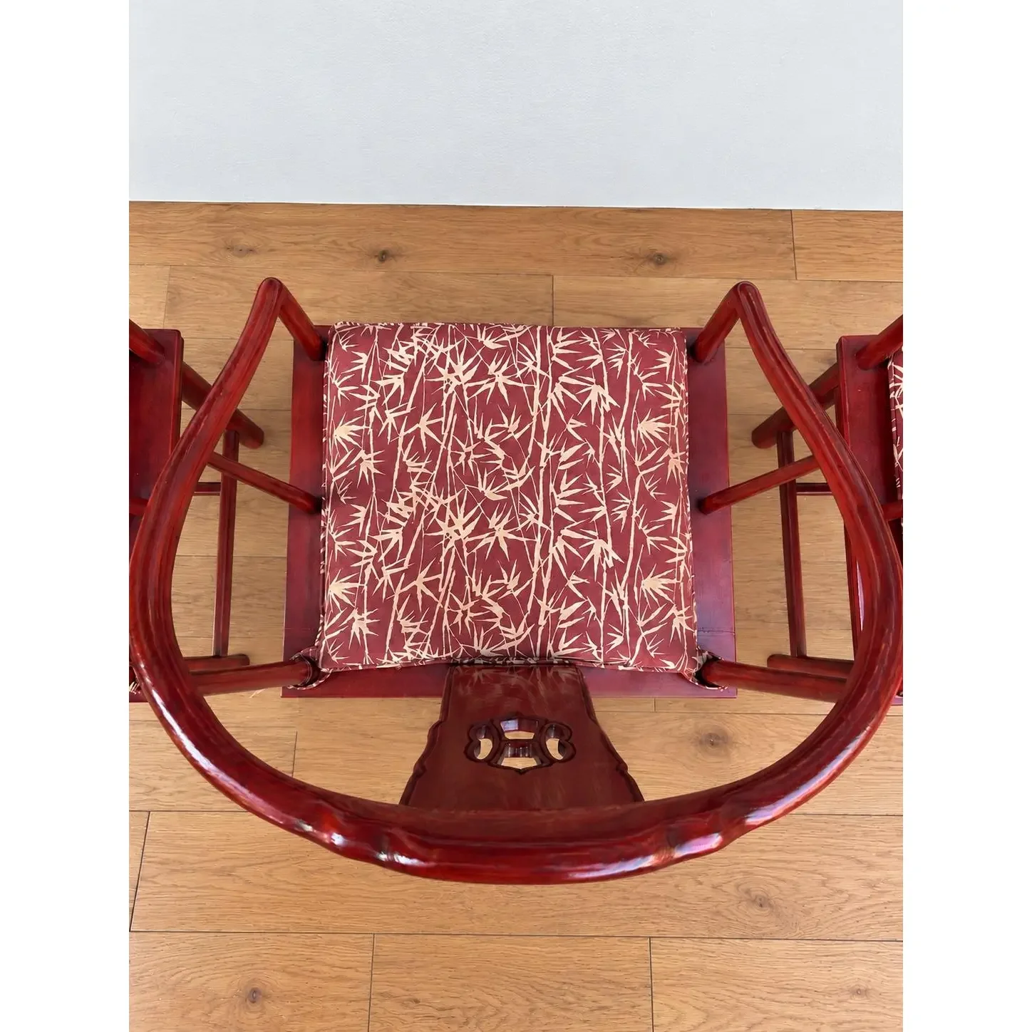 vintage-chinese-horseshoe-back-arm-chairs-with-palm-pattern-seat-cushions-set-of-4-5877.webp