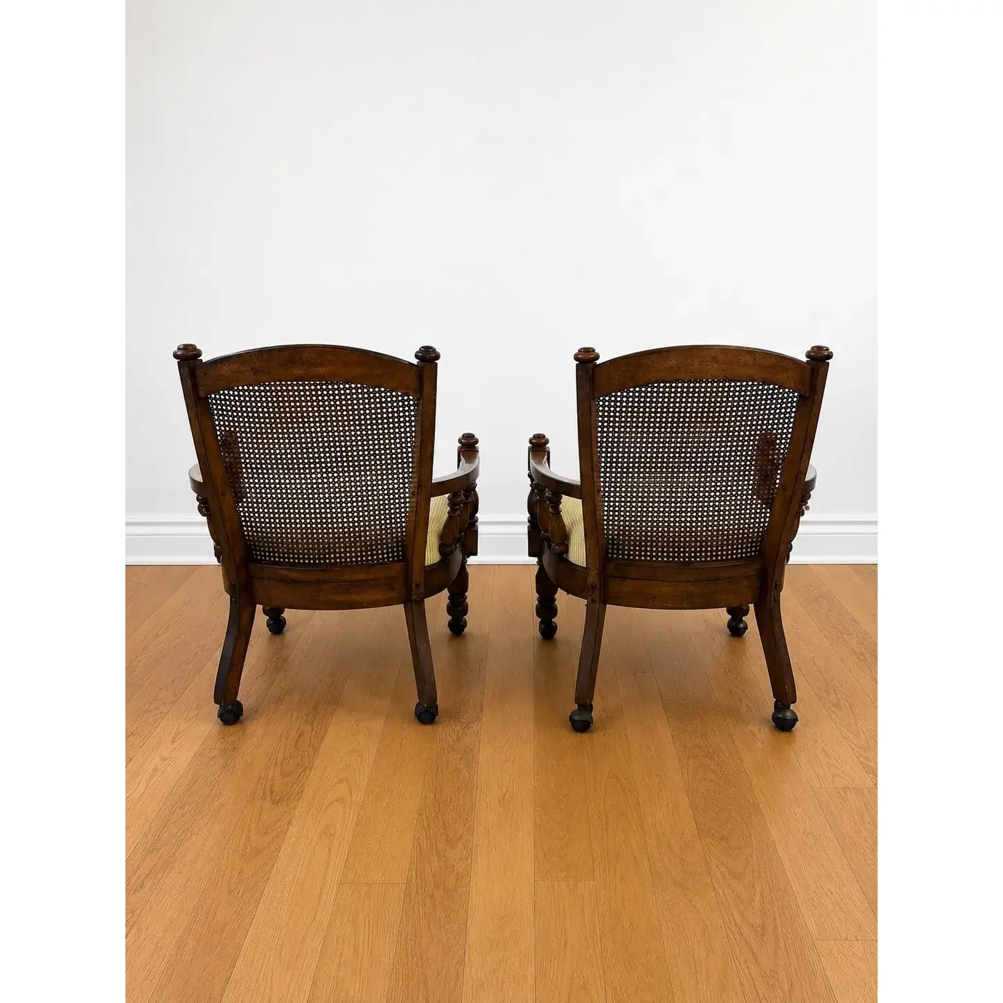 pair-of-1970s-kane-back-captains-chairs-antiqued-walnut-stained-frames-new-seat-cushions-with-new-upholstery-3485.webp