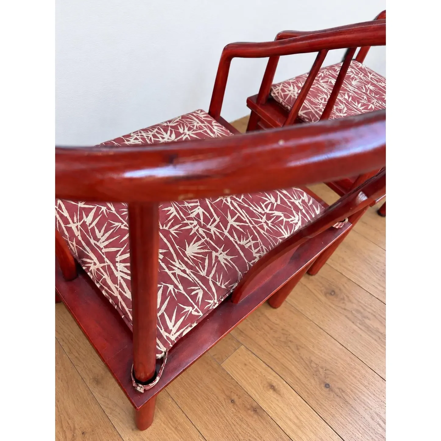 vintage-chinese-horseshoe-back-arm-chairs-with-palm-pattern-seat-cushions-set-of-4-9733.webp
