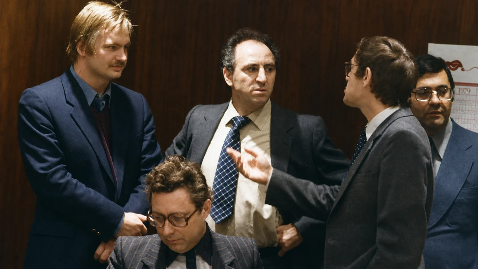 Grandmasters having a conversation at a chess tournament