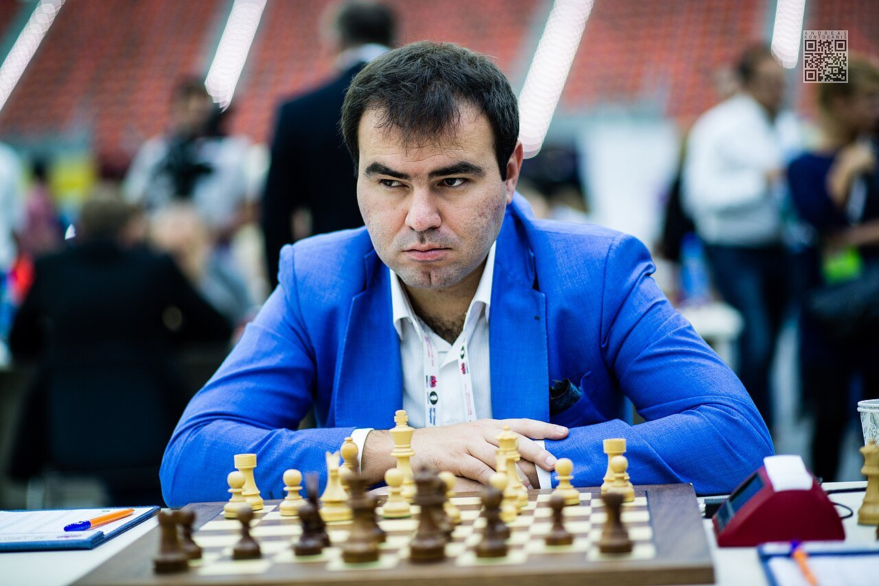 Grandmaster at a chessboard