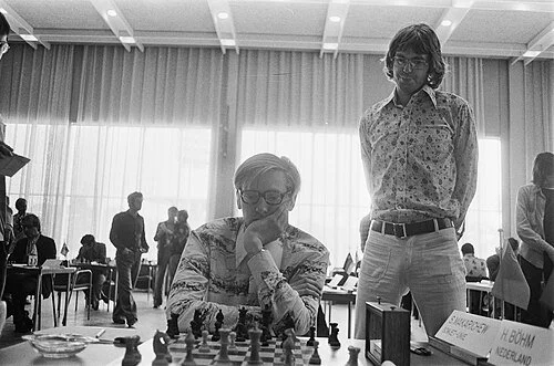Makarichev sitting at a chessboard