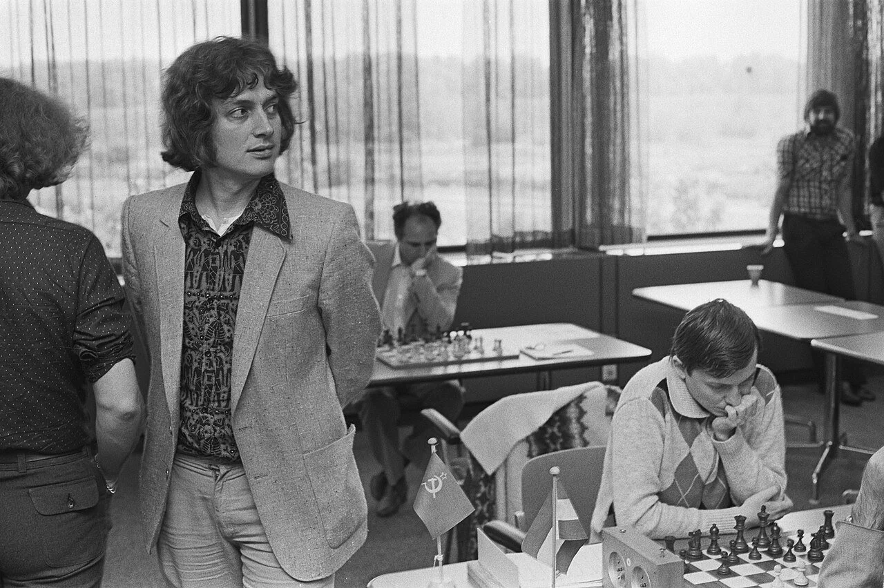 Jan Timman gazing up something special while Lev Polugaevsky and Anatoly Karpov contemplate