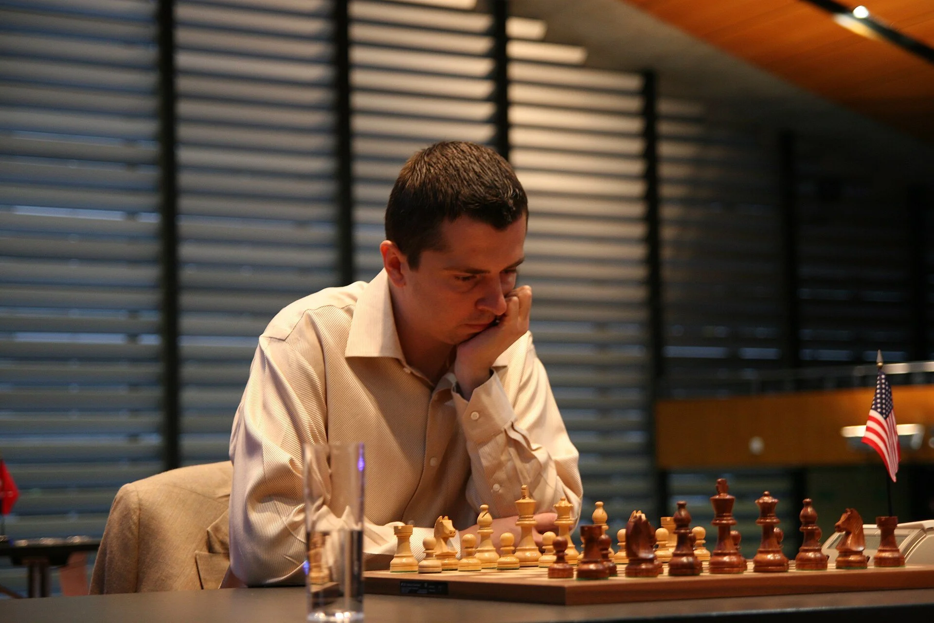 Alexander Onischuk in thought at the chess board