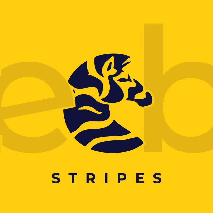 A yellow background with a black abstract zebra and the word "STRIPES" below.