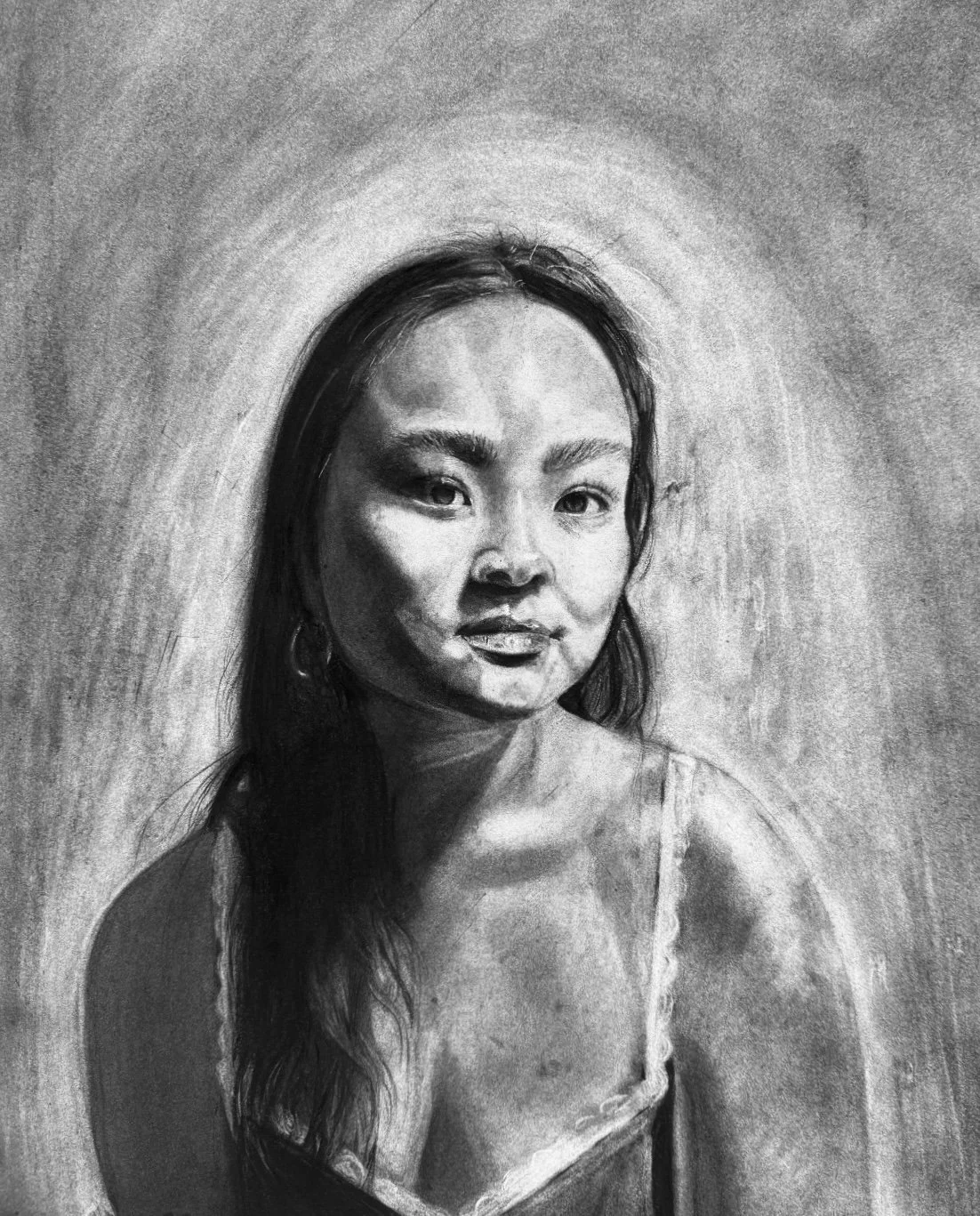 self portrait | (nov. 2024) charcoal on 18" x 24" drawing paper | it was certainly a reckoning drawing myself — sometimes i don't even know what i look like (still don't) ... there were some mishaps while blending (i used too much pressure with the d