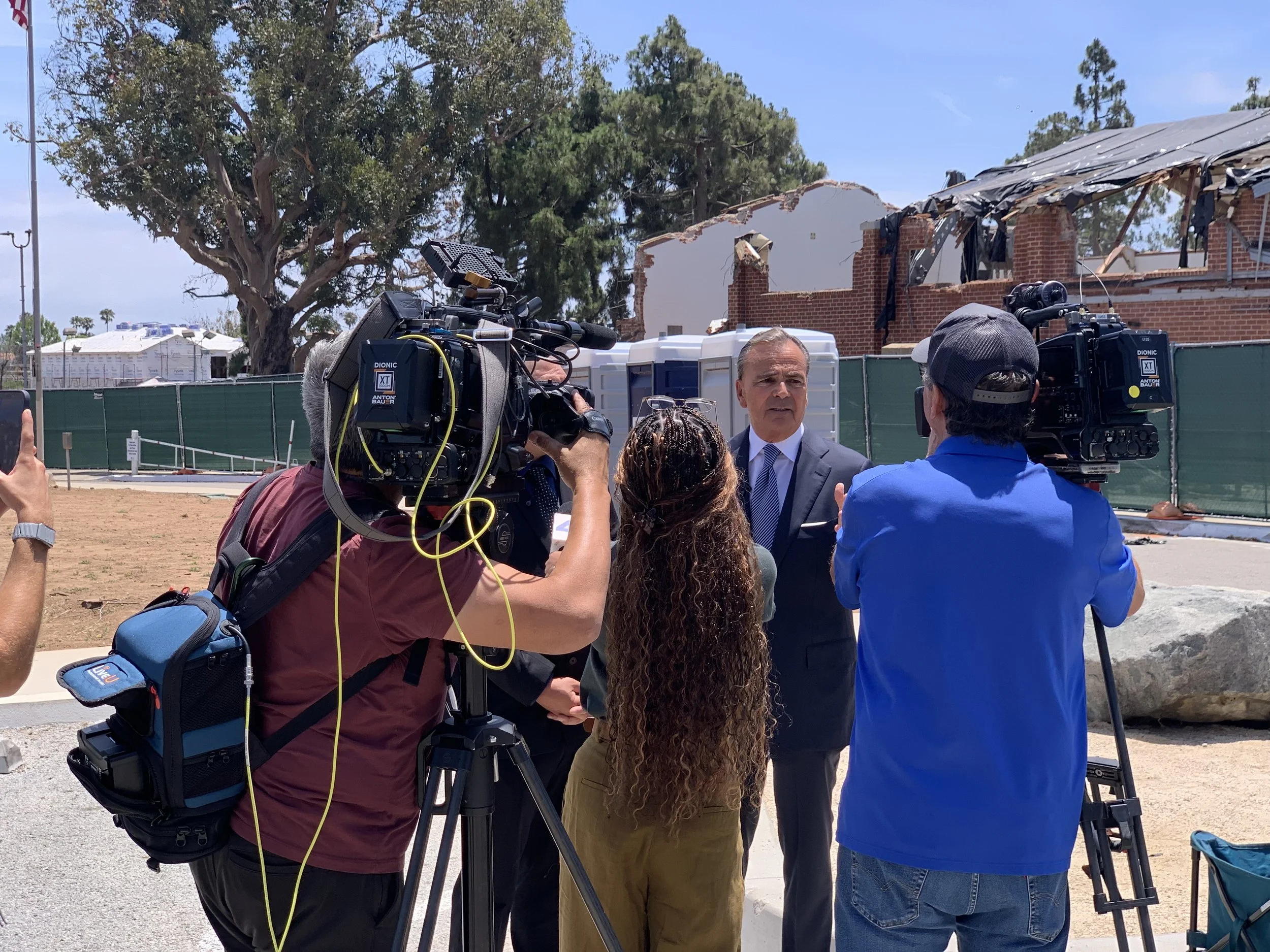  Developer Rick Caruso speaks to the media near the partially demolished old gymnasium on the afternoon of Tuesday, May 26. Photo by Rich Schmitt/Palisadian-Post 