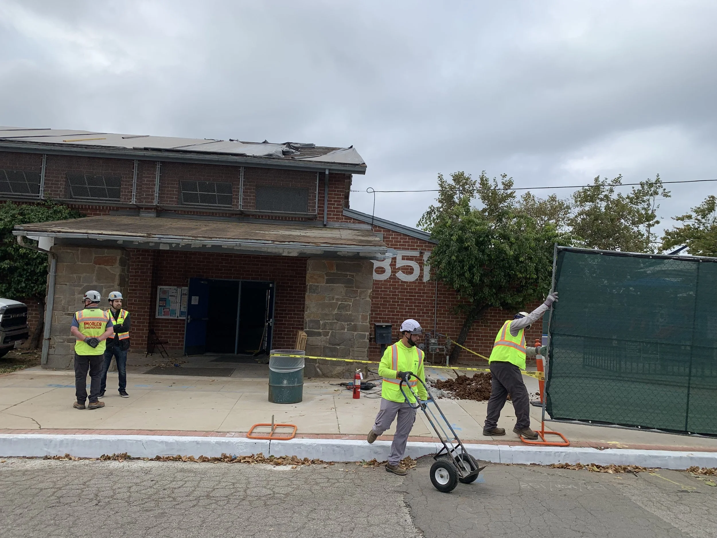  Work crews from Morley Builders arrive at the old gym to begin demolition early on the morning of Tuesday, May 26. Photo by Rich Schmitt/Palisadian-Post 