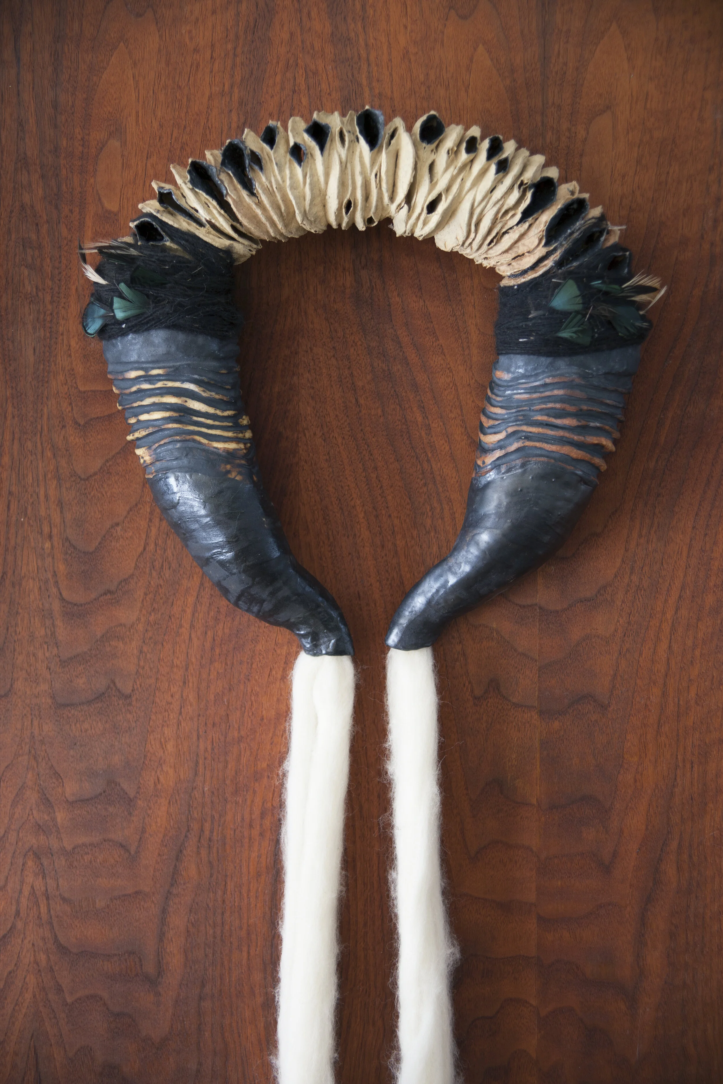 Yoke , 28x18x8, ceramic, burnt out cosmetic pads, wool, feathers