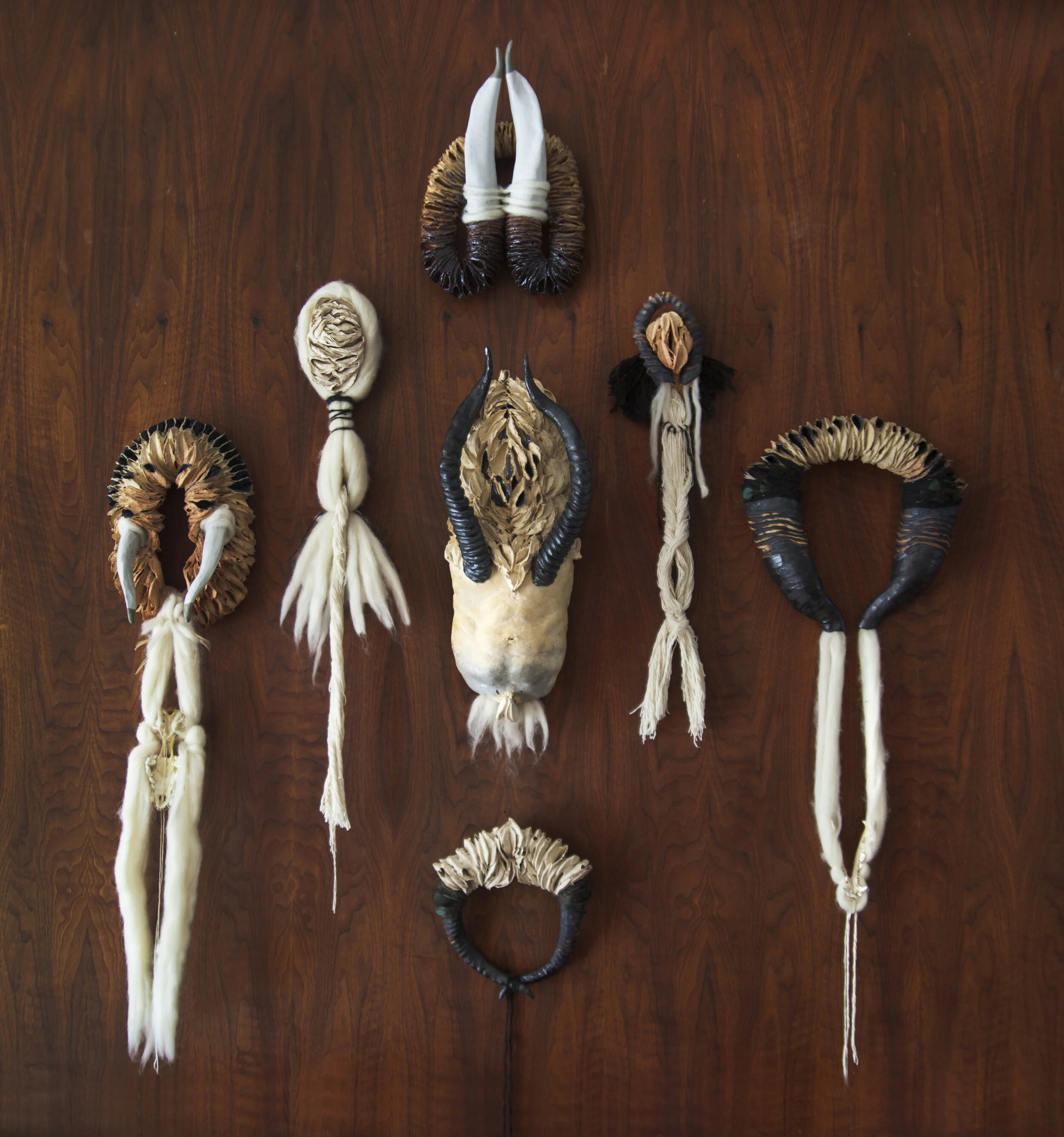 Trophies, 82x78x12, glazed ceramic, burnt out cosmedic pads, wool, bone