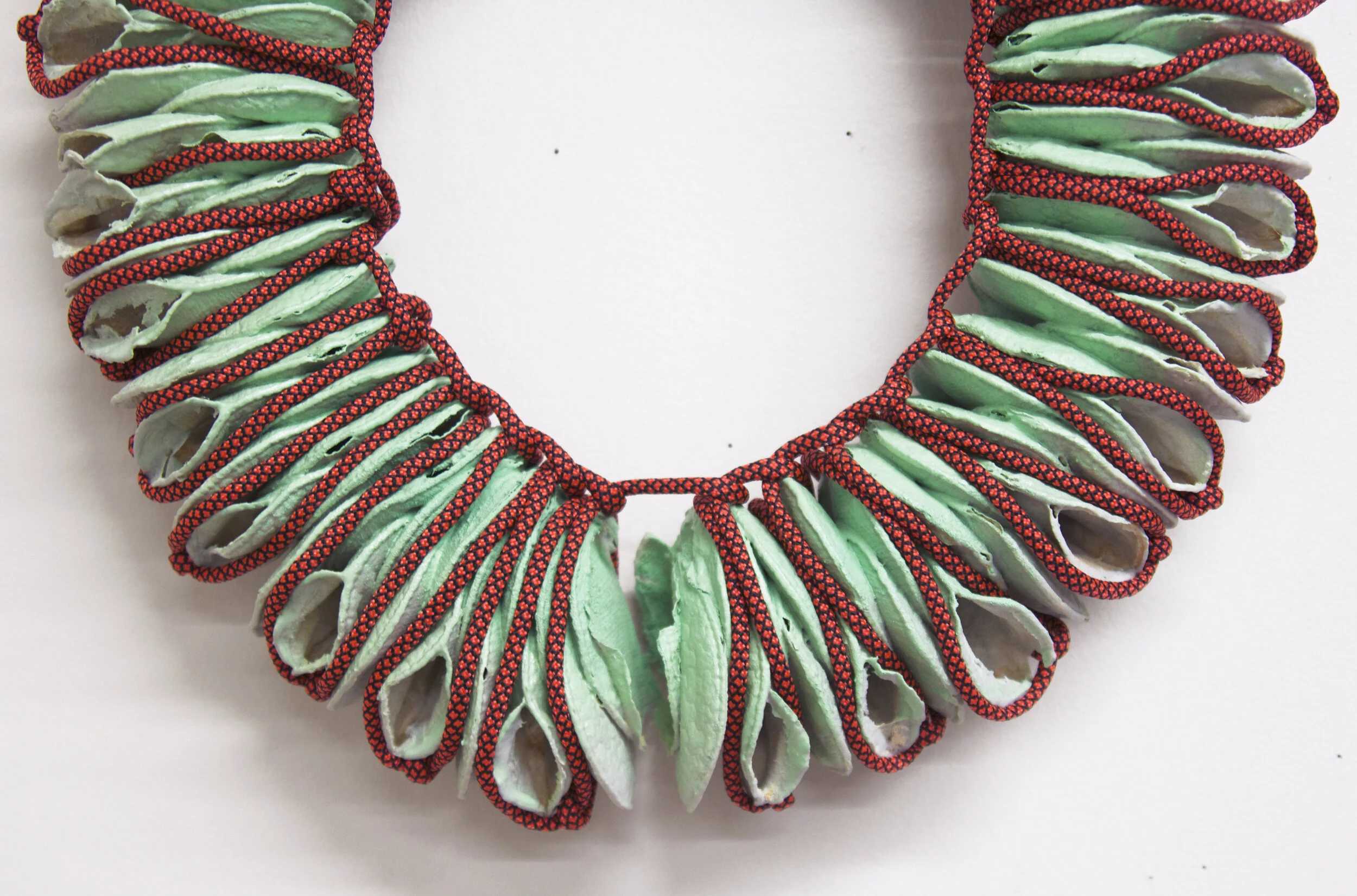 Lei, 16x14x4, ceramic, burnt out cosmetic pads, paracord