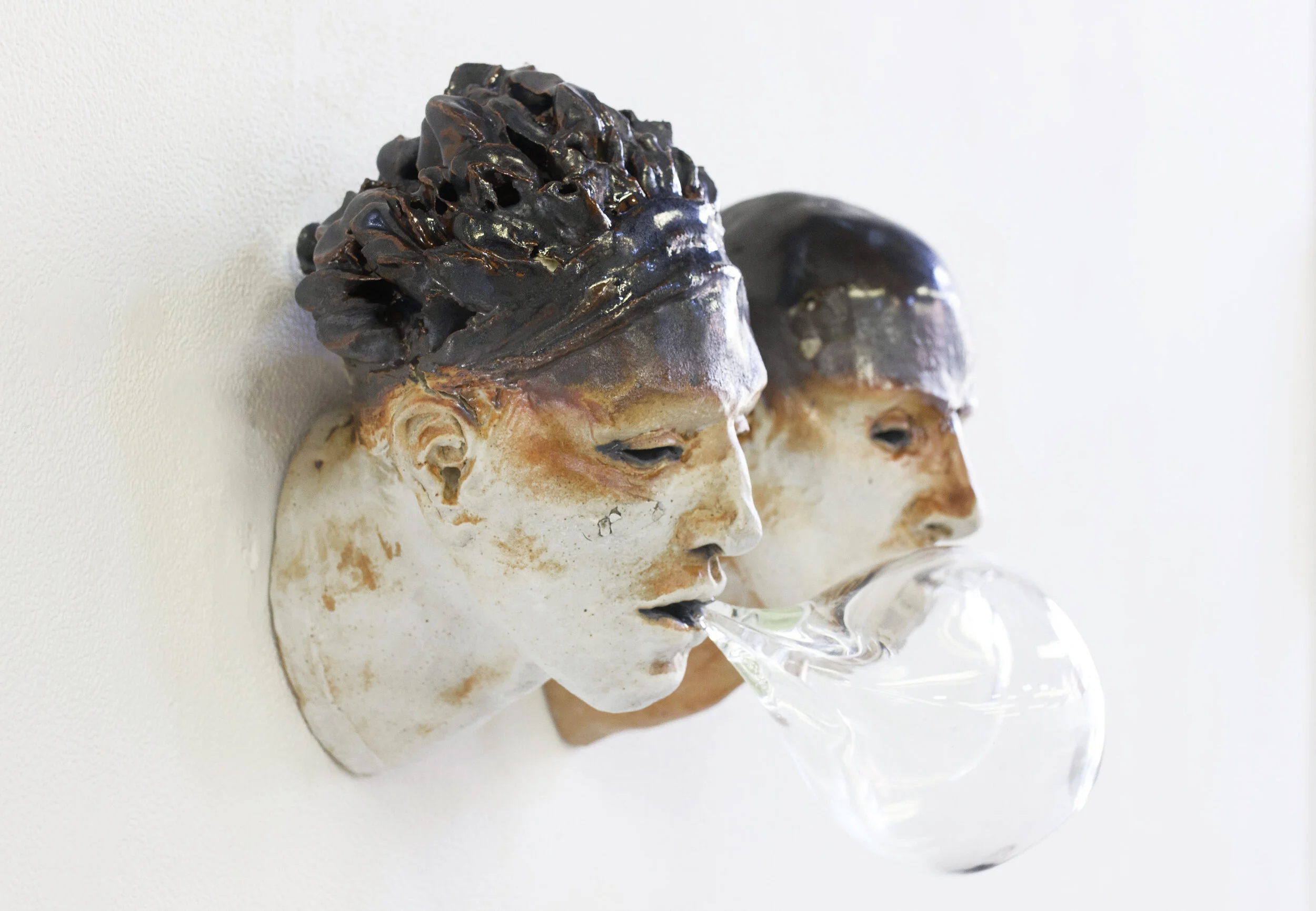 We , 10x16x14, glazed stoneware clay, burnt out cosmetic pads, blown glass