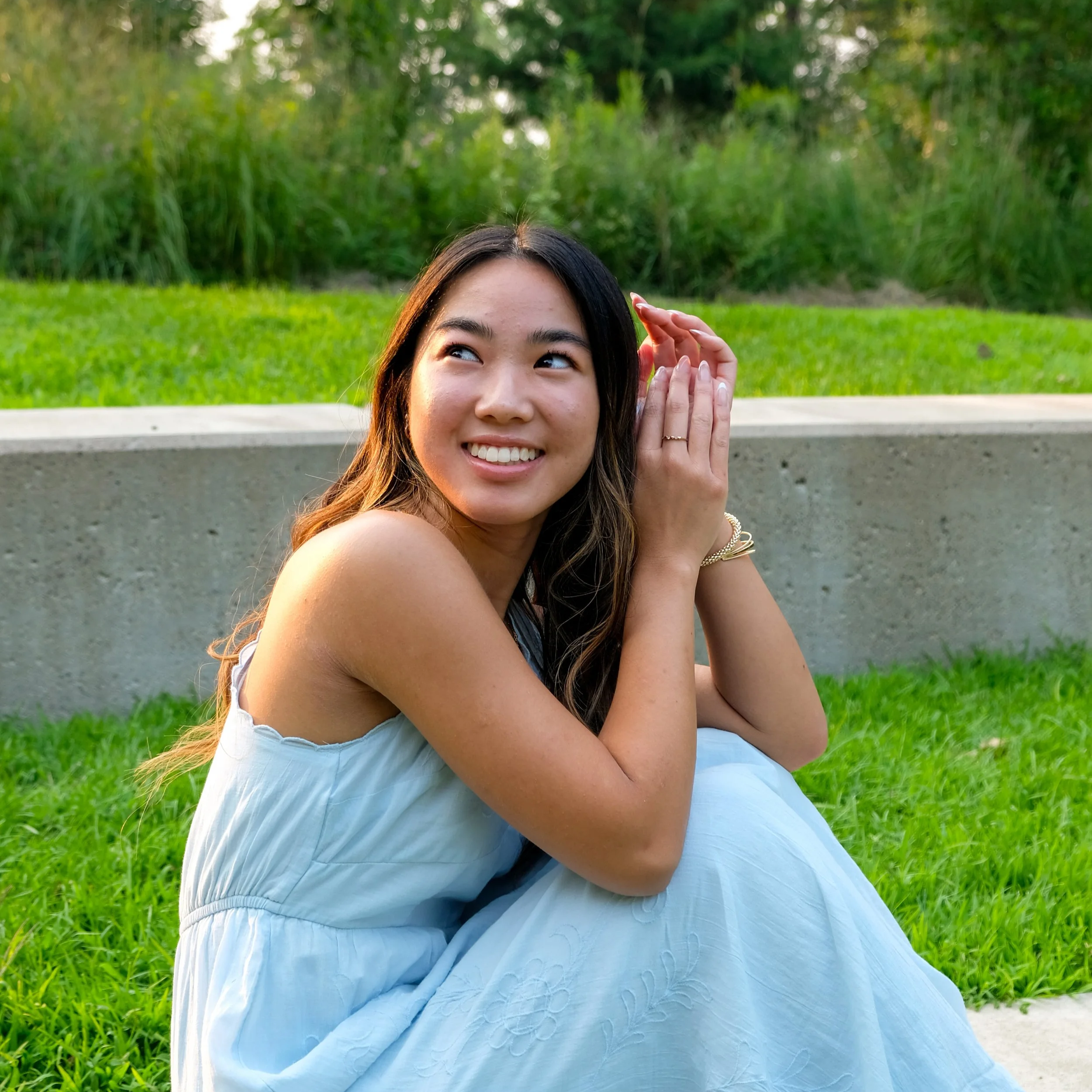 A digital illustration showing a tablet and laptop displaying financial and client access information, with a white hand icon pointing at the tablet's upper left corner, set against a light textured background with pink abstract shapes.