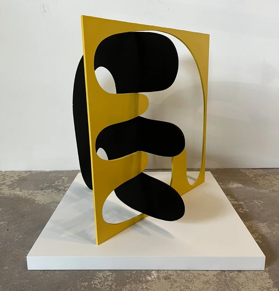Folded “E” (2025), acrylic and spray paint on steel, 24 × 24 × 24 in.