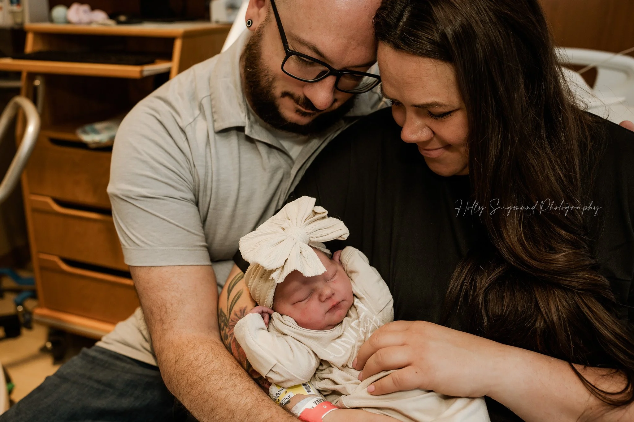 Mother holding her newborn at St. David’s Women’s Center of Texas in Austin, Texas