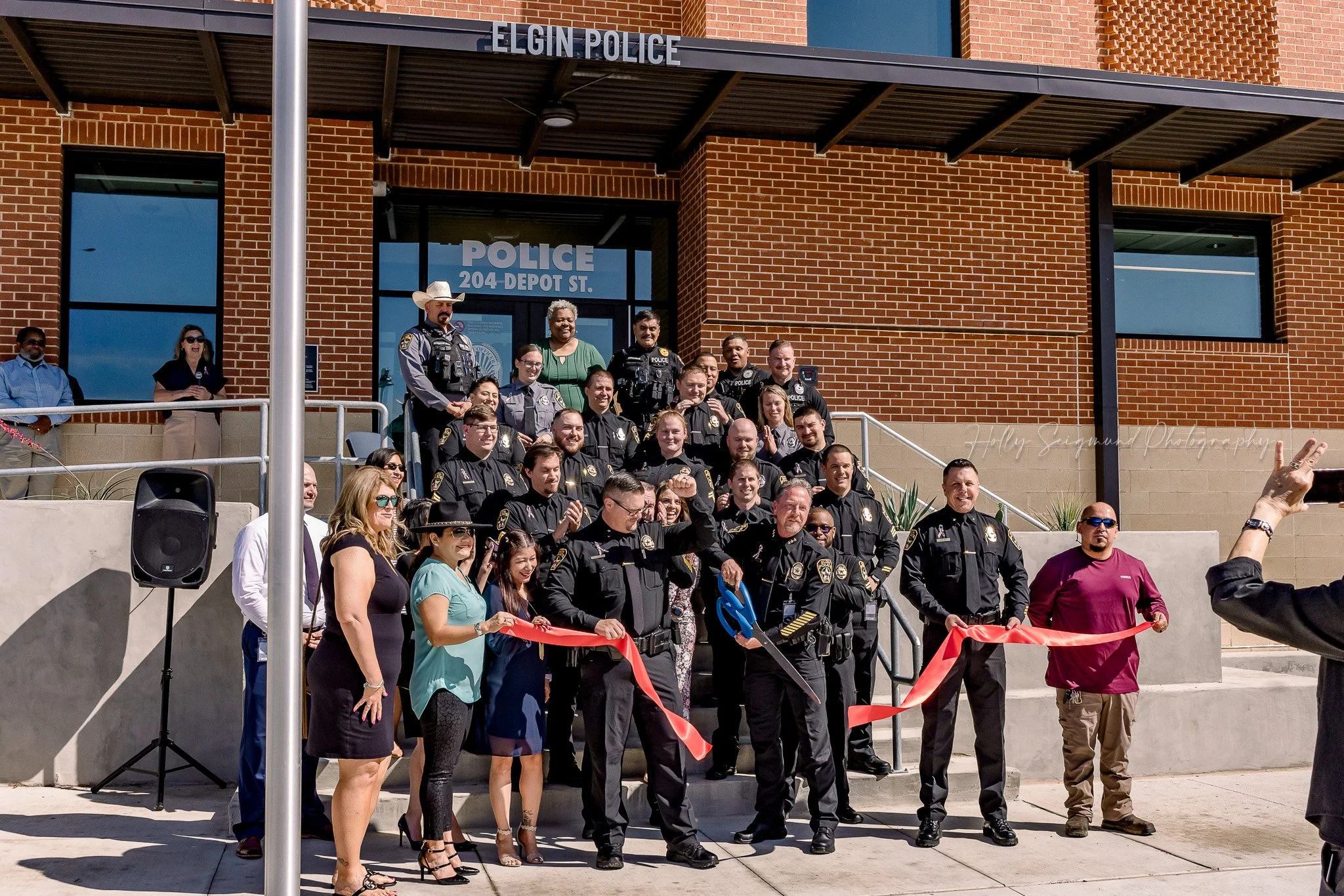 Ribbon cutting ceremony at Elgin Police Department grand opening in Elgin Texas