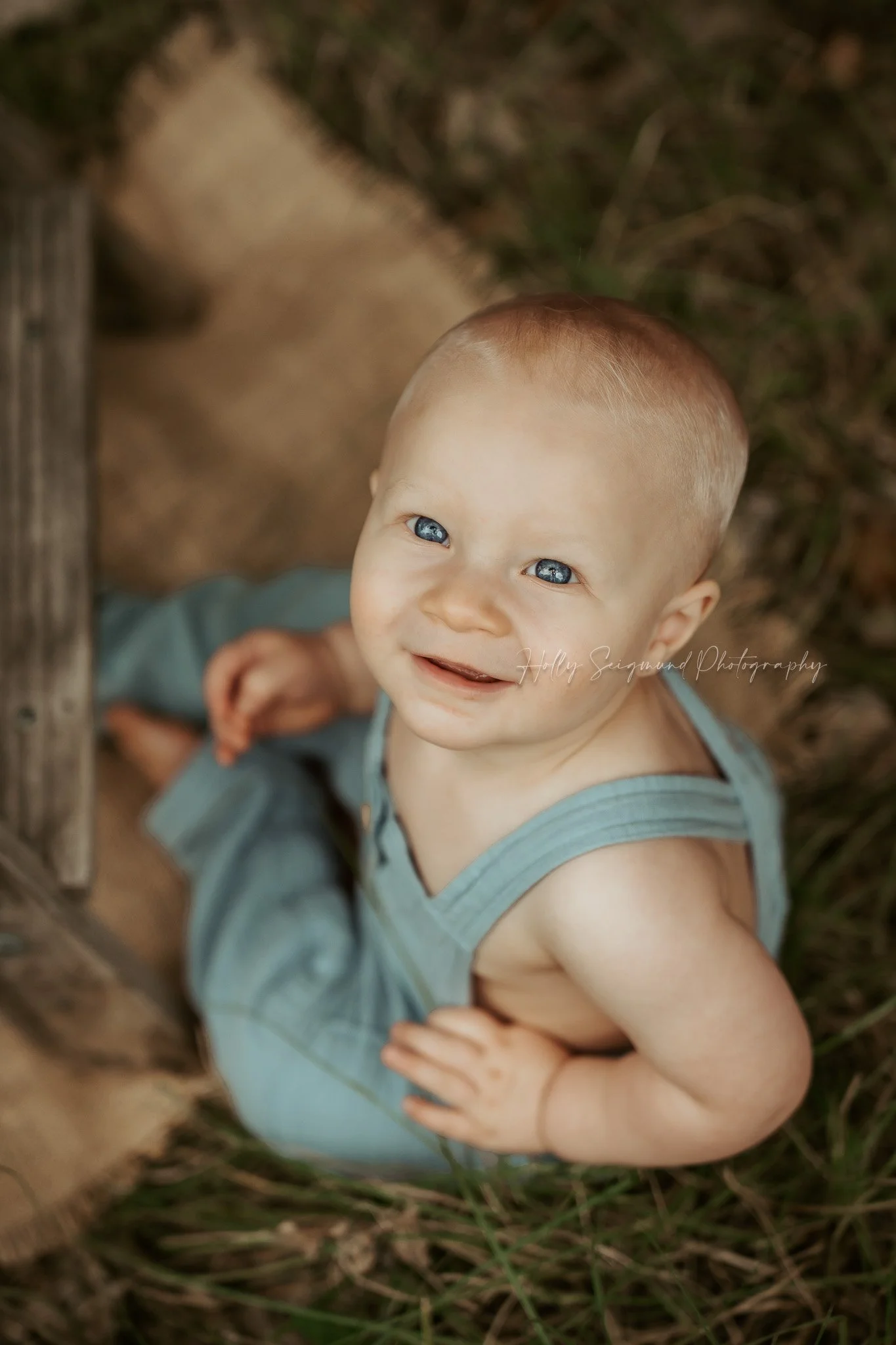 Baby boy first birthday photos in an outdoor setting in Lee County Texas