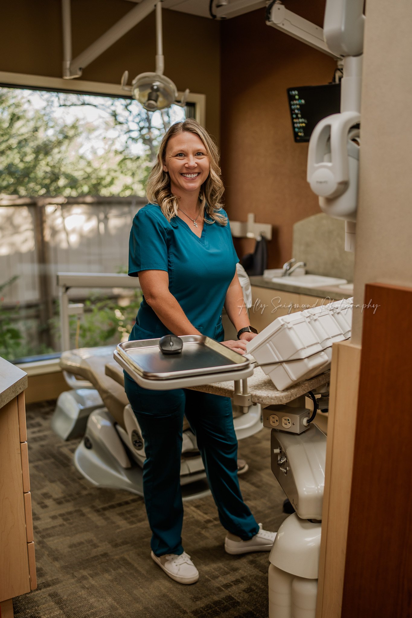 dentist posing for a professional headshot in Elgin Texas