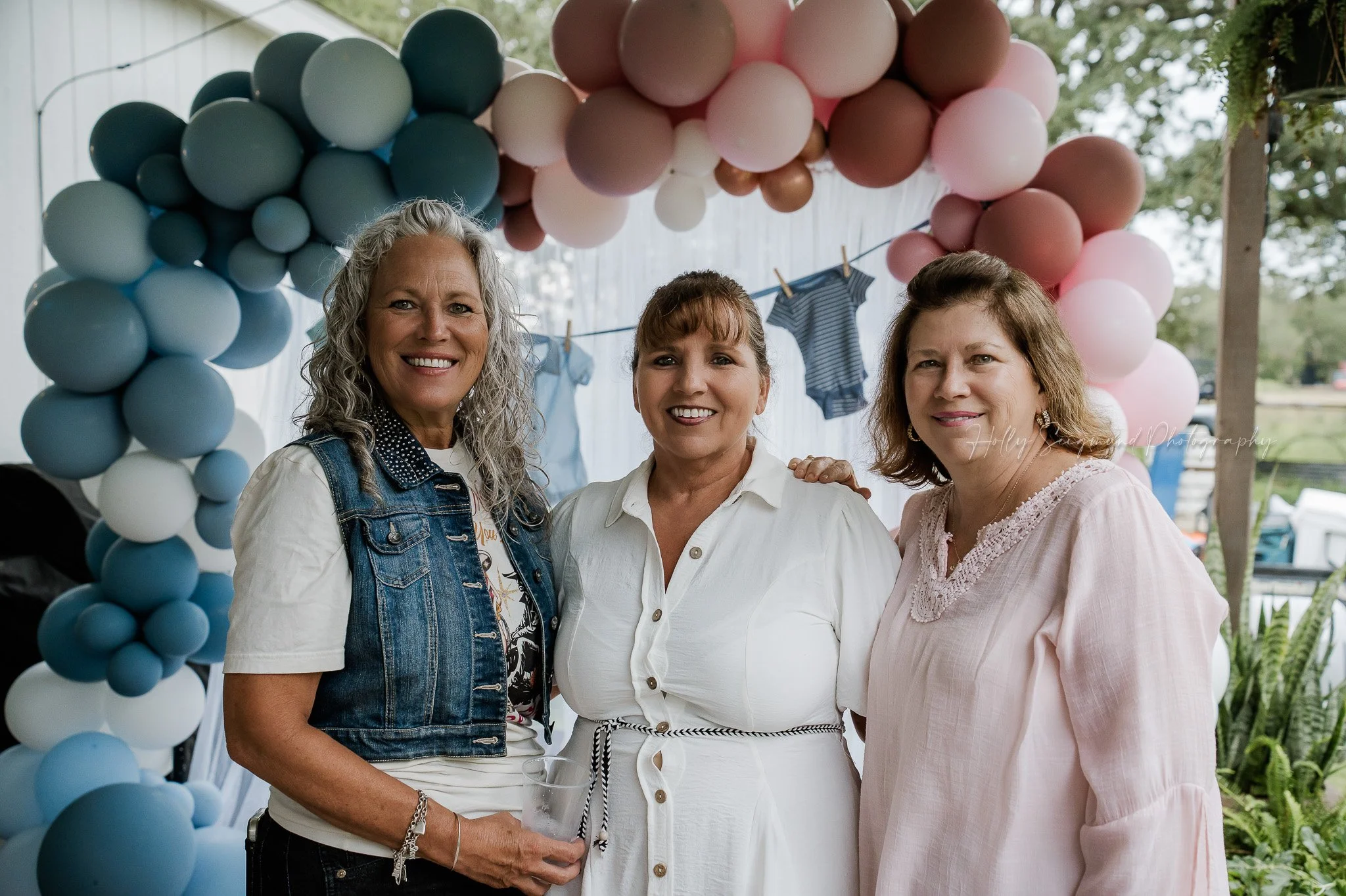 Baby shower decor and guests photographed by Central Texas event photographer