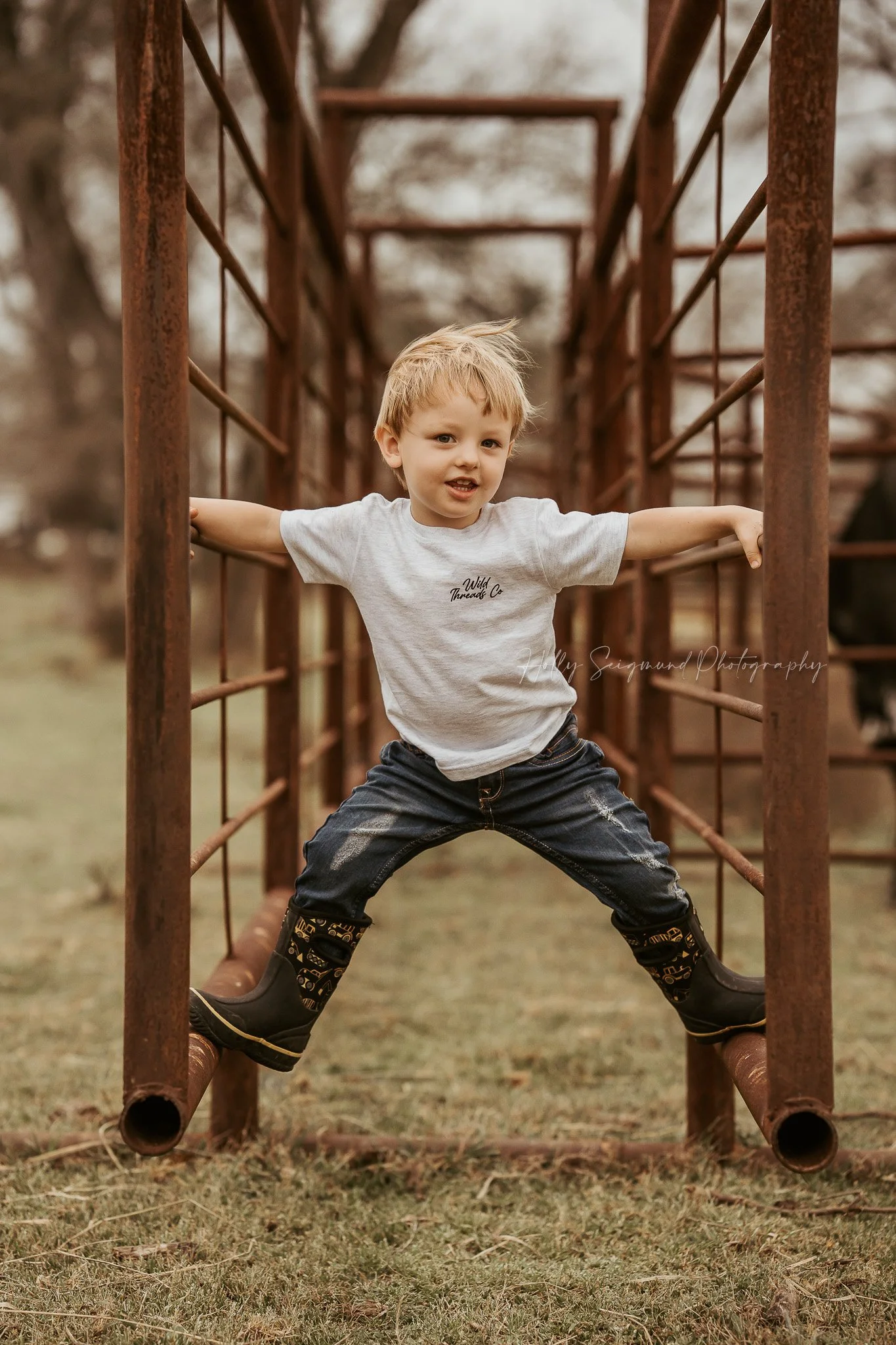 child celebrating a birthday outdoors in a country setting in Texas with natural light