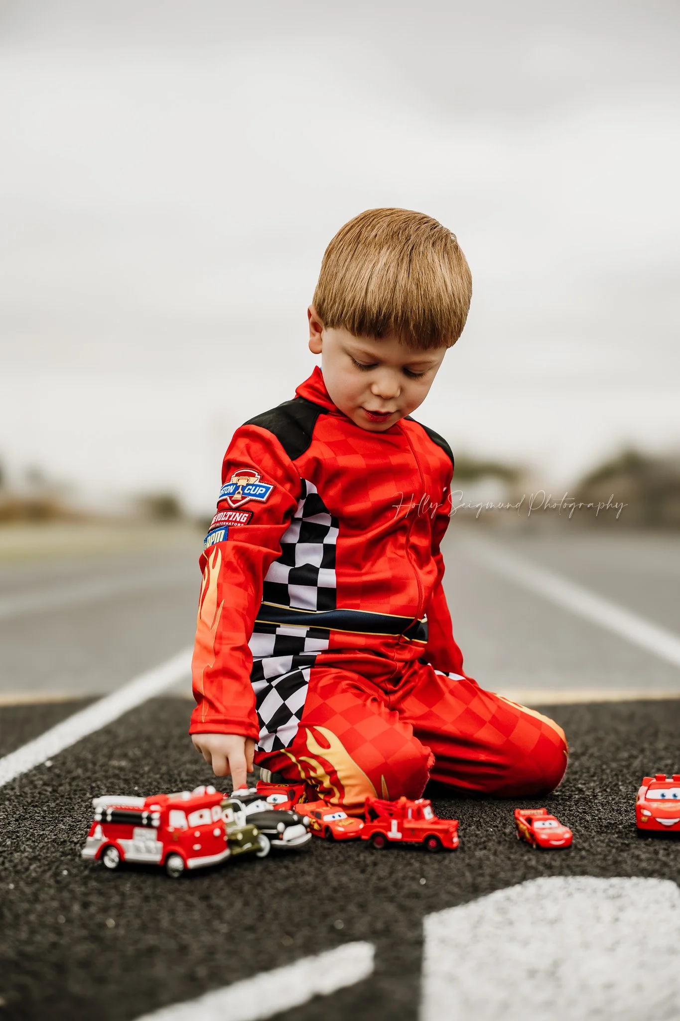 birthday photos of a 4-year-old boy with a race car theme in Giddings Texas