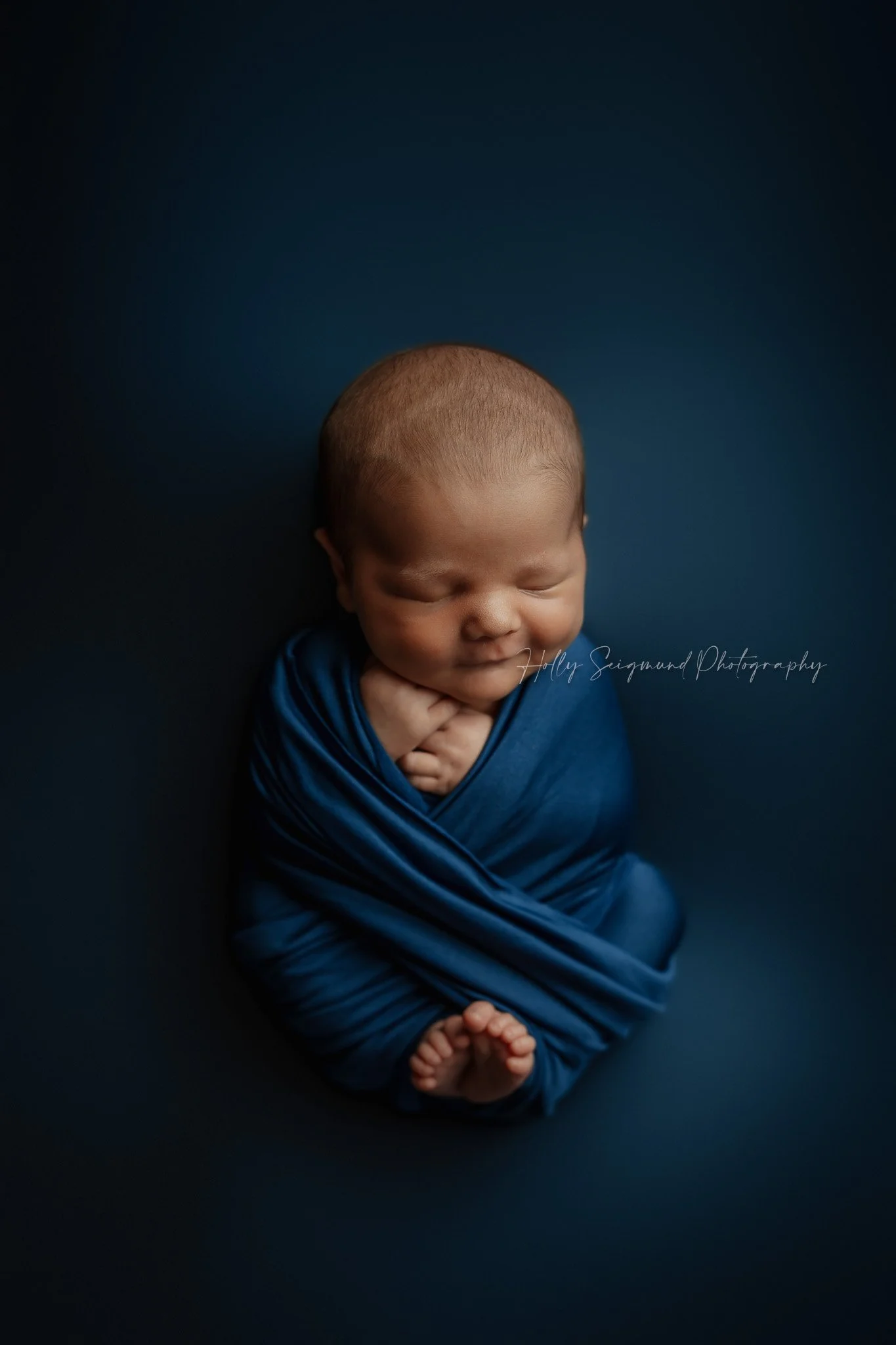 78947-baby-boy-blue-newborn-photography-session.jpg