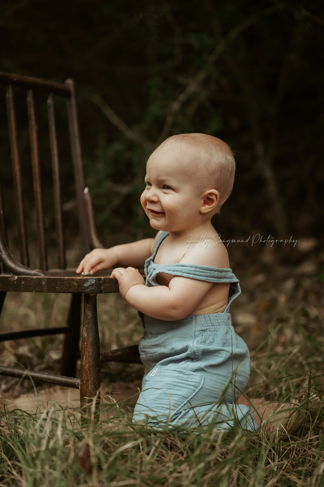 First birthday photo session in Central Texas with one-year-old in outdoor natural light setting