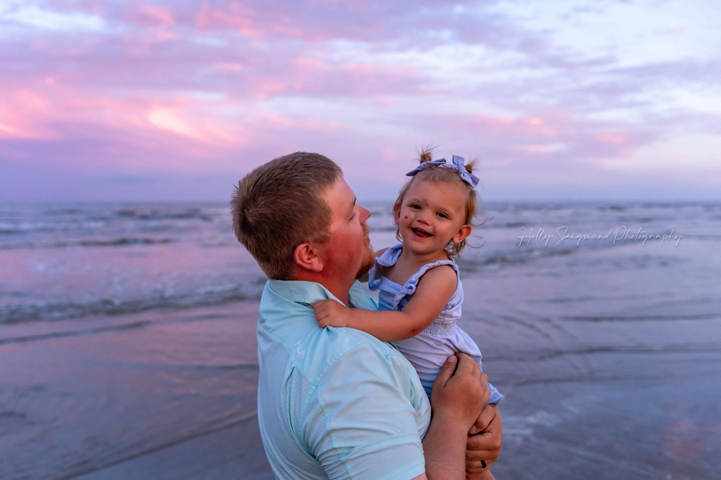Dad and daughter during sunset beach photos in Port Aransas Texas