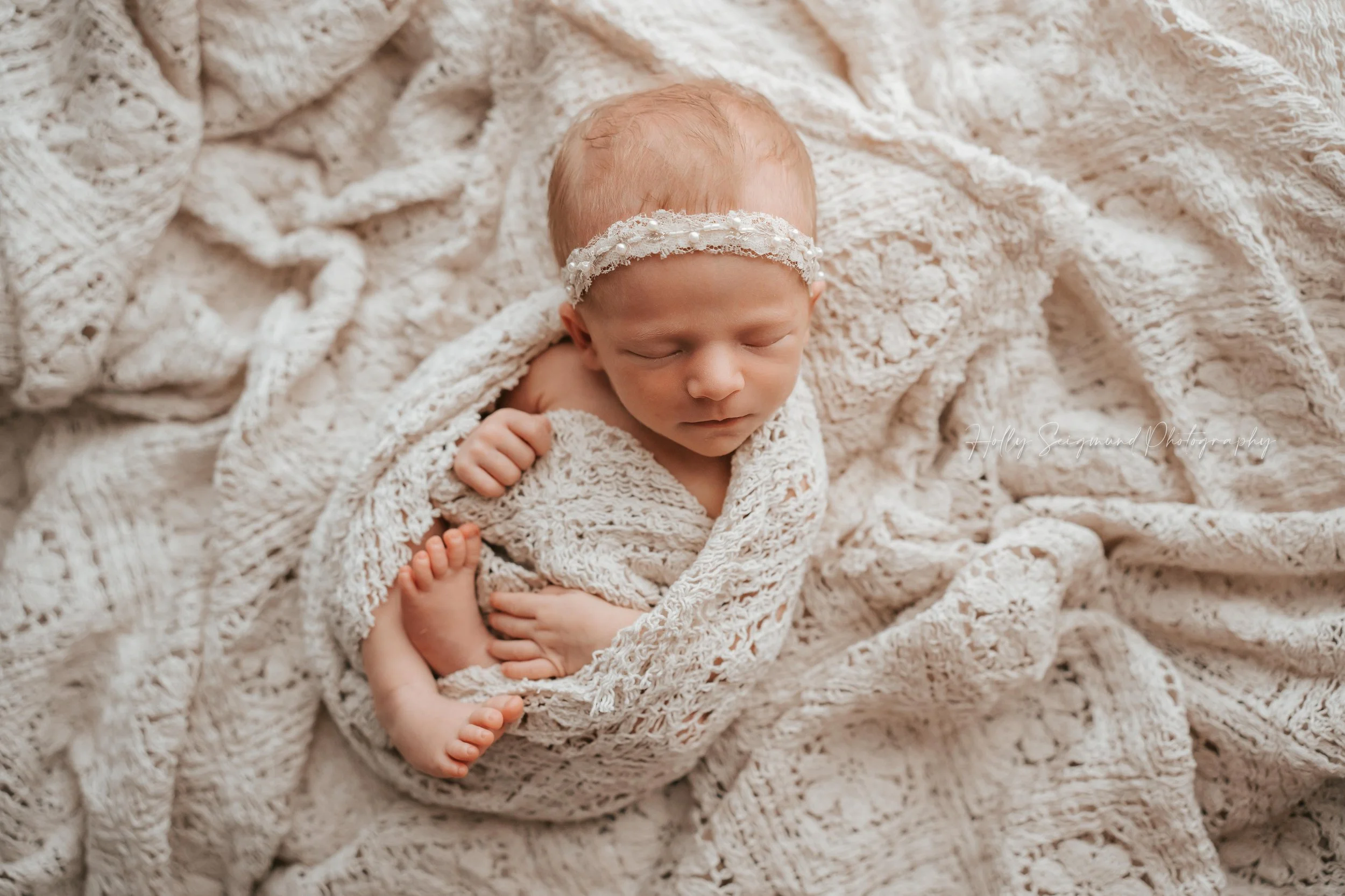 Lee County Texas newborn session with baby girl wrapped in vintage crochet