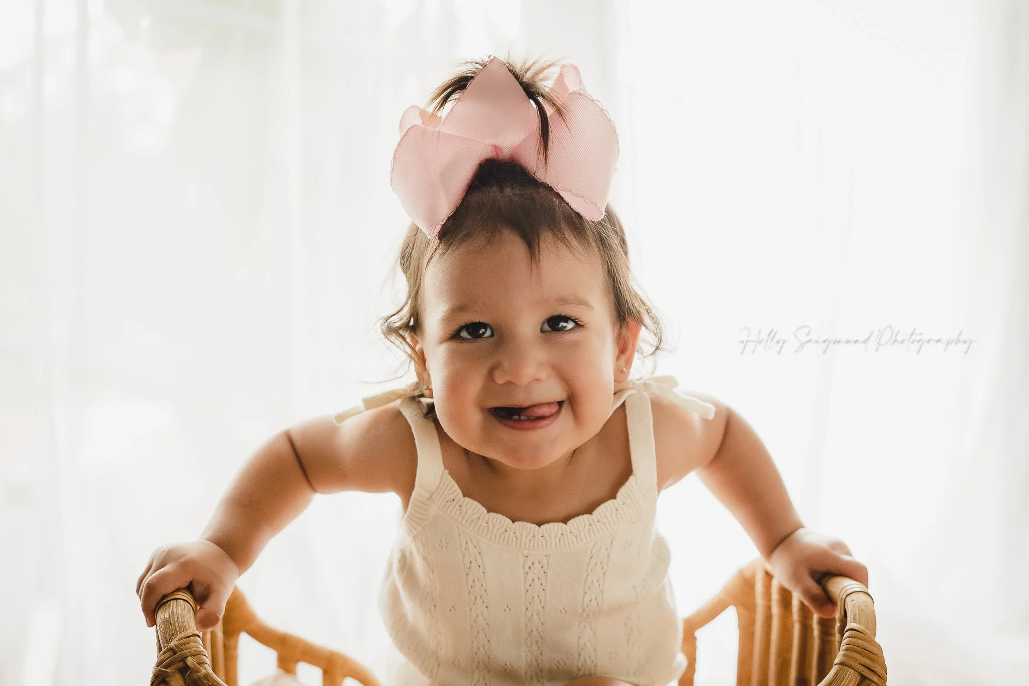Baby girl boho first birthday photos in a natural light studio in Lexington, Texas