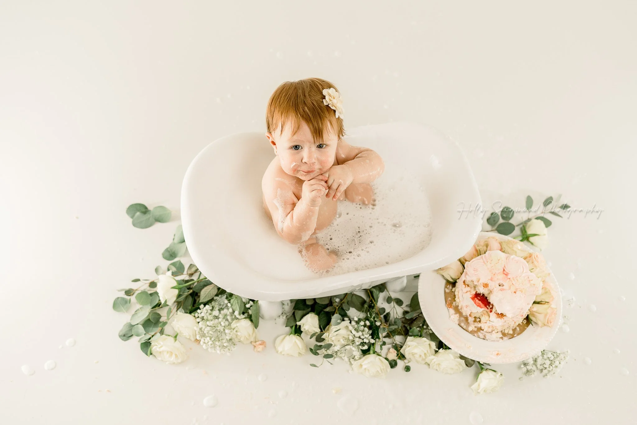 floral smash cake session cleanup in a natural light studio in Lee County Texas