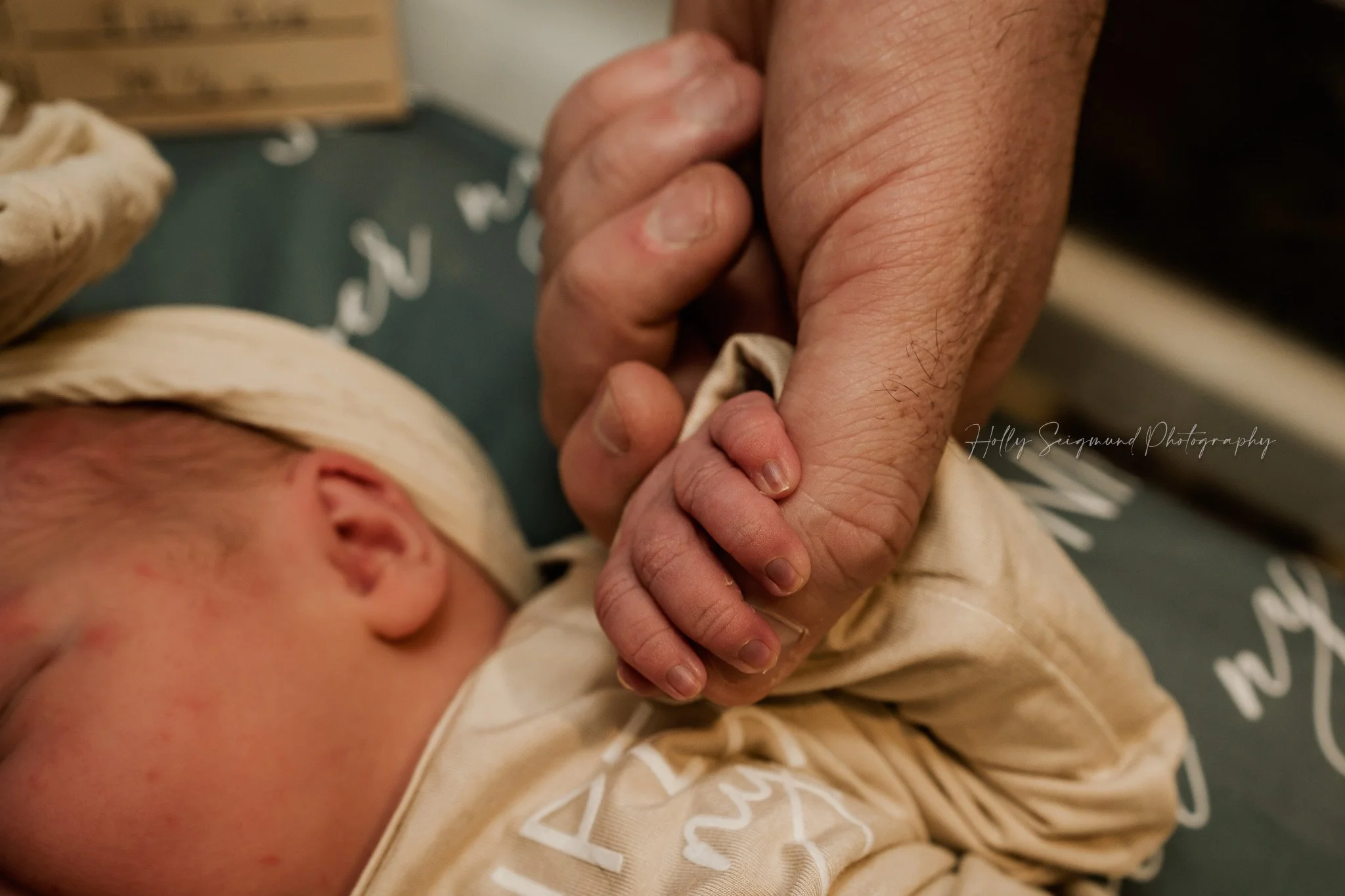 Close-up of newborn baby’s tiny fingers at St. David’s Women’s Center of Texas