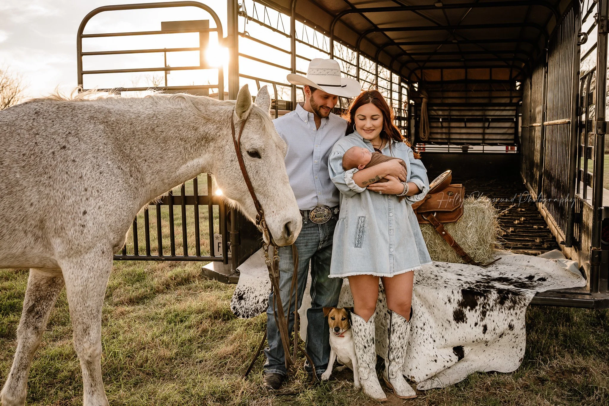 Family Newborn photo with horse and cattle trailer in Lee County Texas