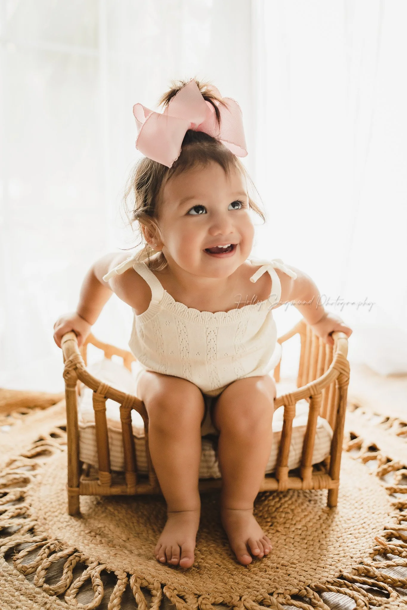 Baby girl boho first birthday photos in a natural light studio in Lee County, Texas