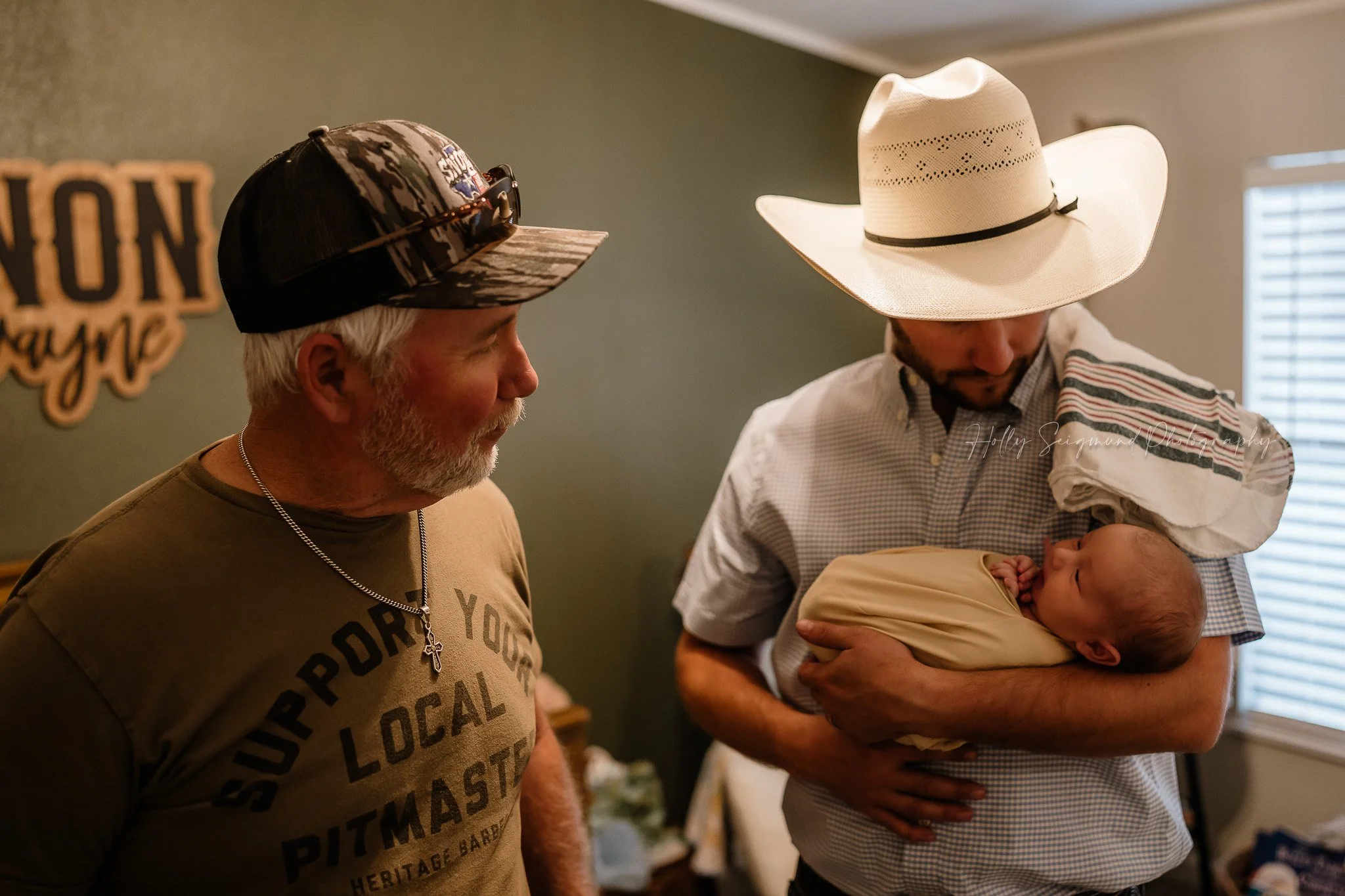 Family lifestyle newborn photos with dad and grandpa in Central Texas