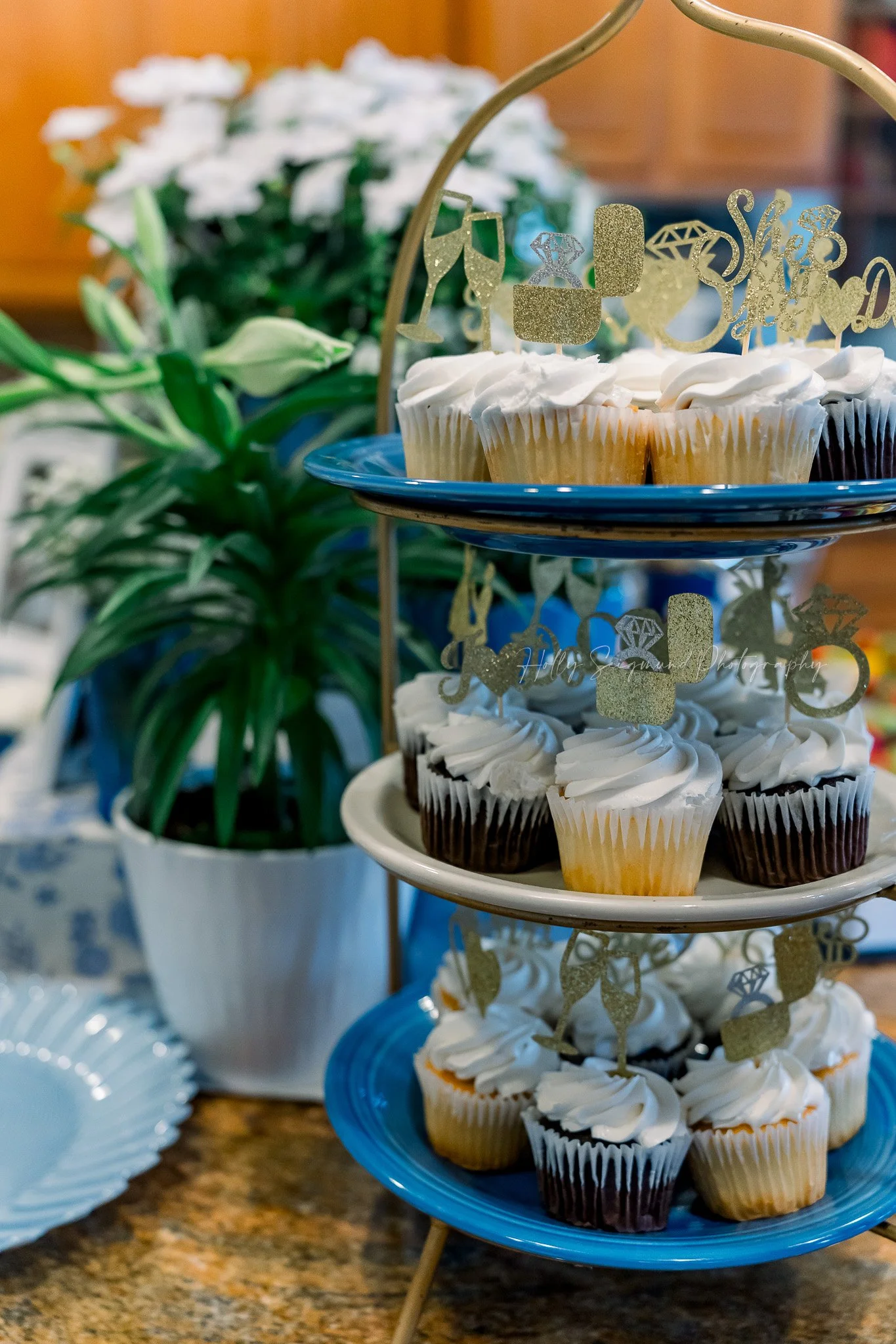 Bride opening gifts during her bridal shower in Central Texas