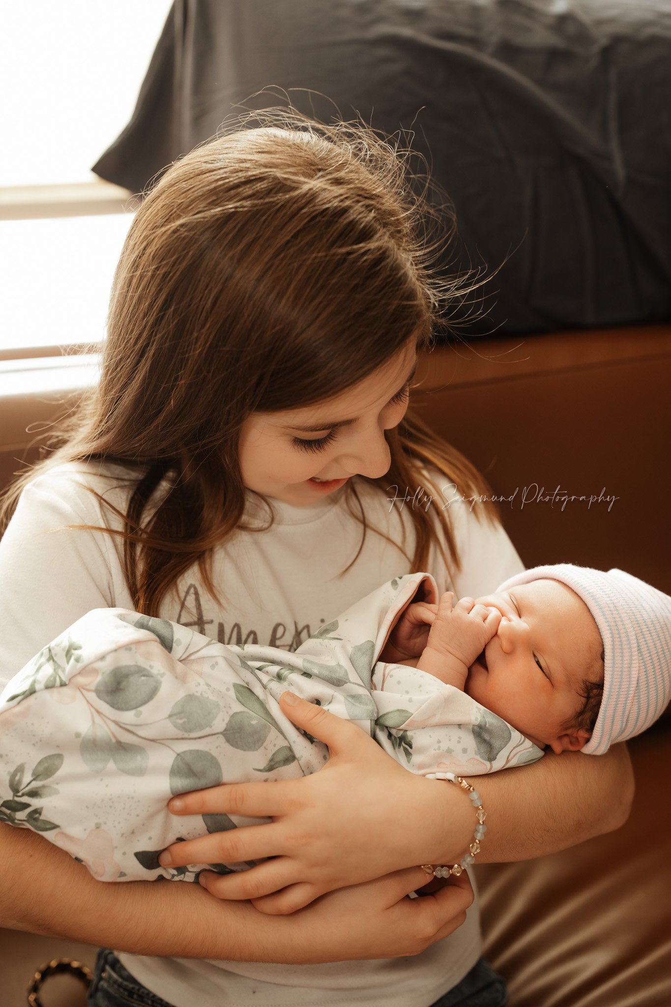 Newborn baby yawning during Fresh 48 session at St. David’s Georgetown Hospital