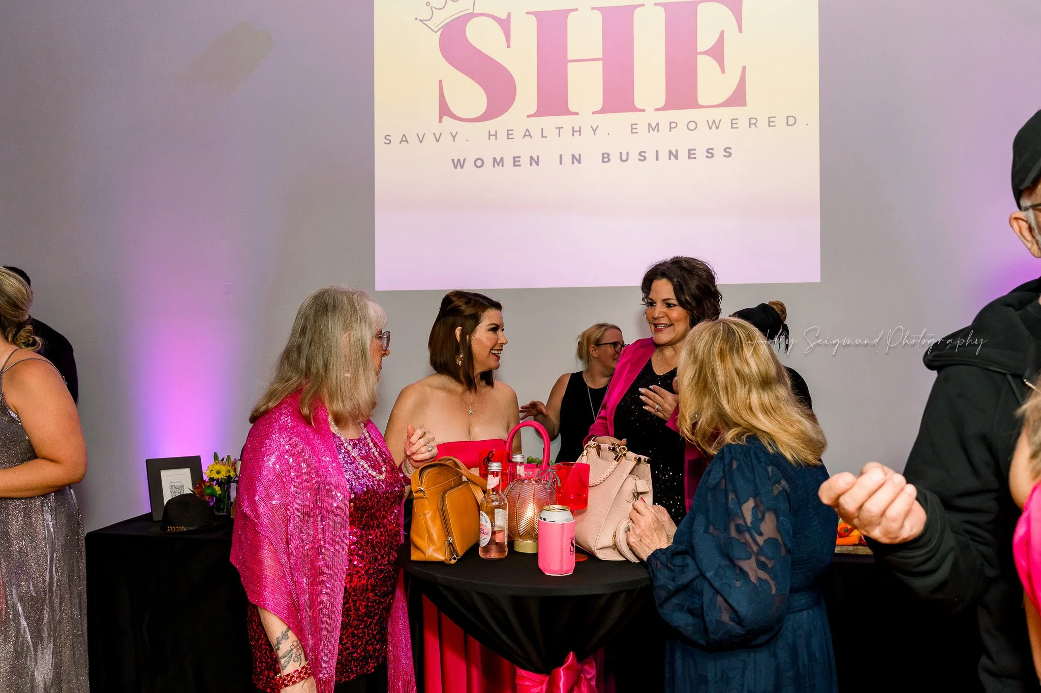 Women entrepreneurs participating in ribbon cutting ceremony in Elgin Texas