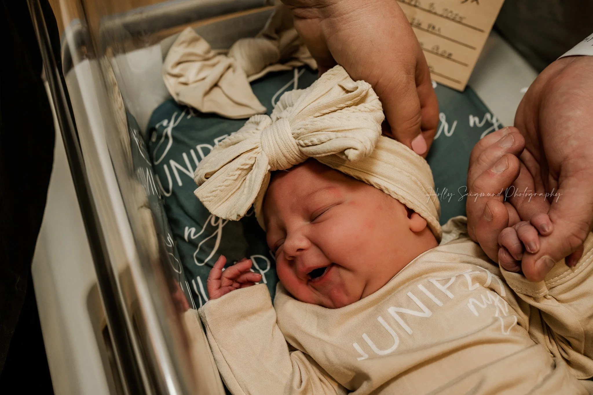 Newborn baby yawning during Fresh 48 session at St. David’s Women’s Center of Texas