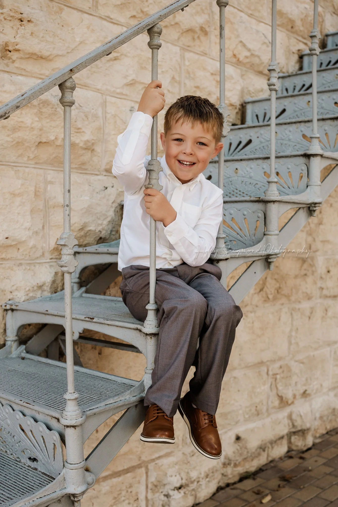 Boy's 6th birthday photo session in Georgetown, Texas on the square
