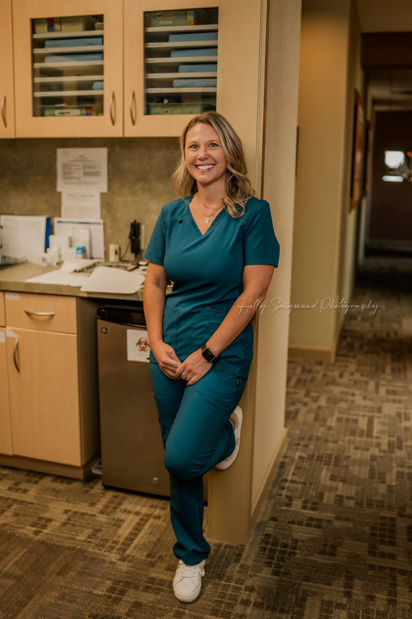 professional portrait of a dentist inside an Elgin TX dental office