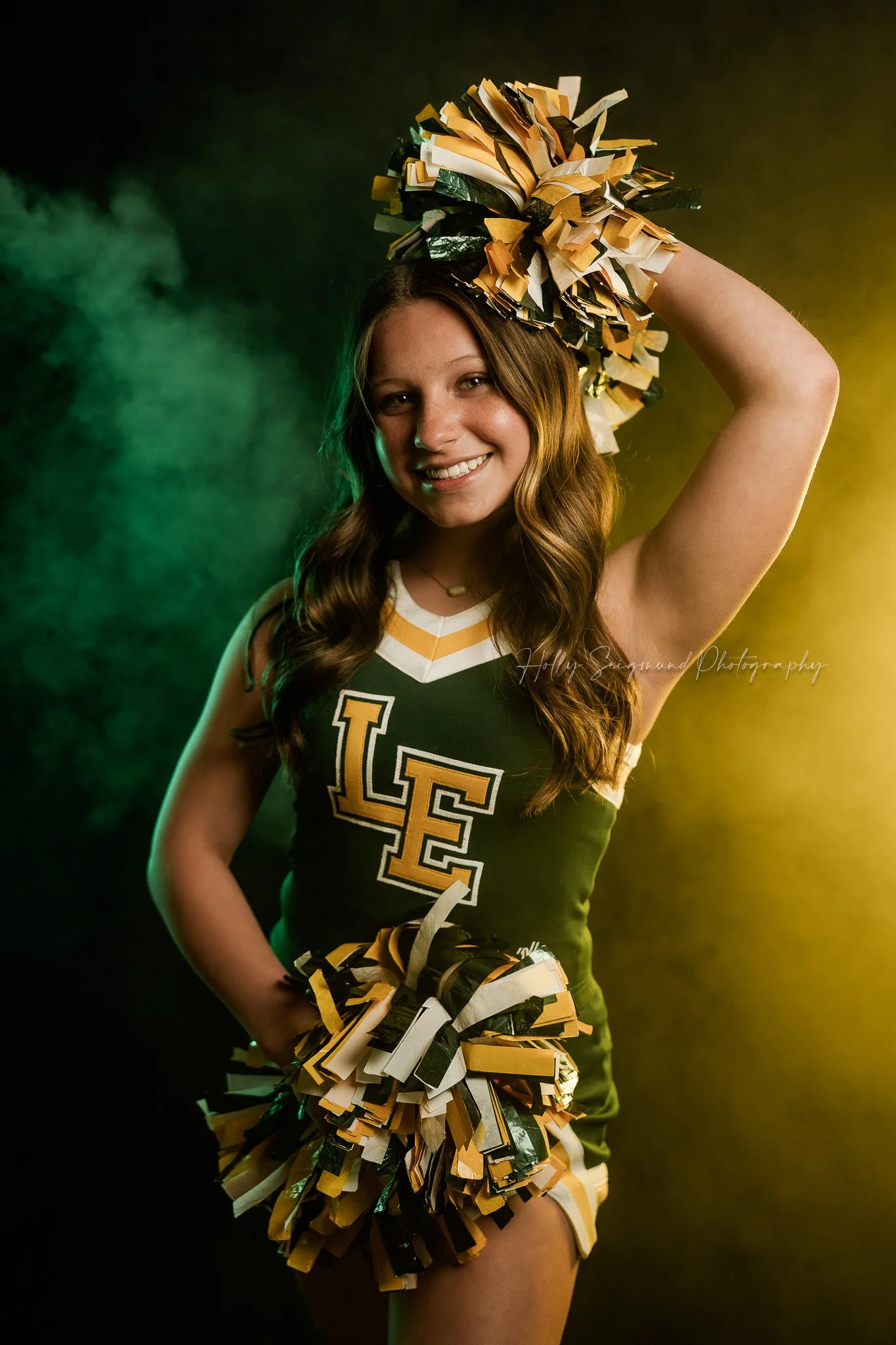 teenage cheerleader celebrating her sweet 16 during a photoshoot in Lee County Texas