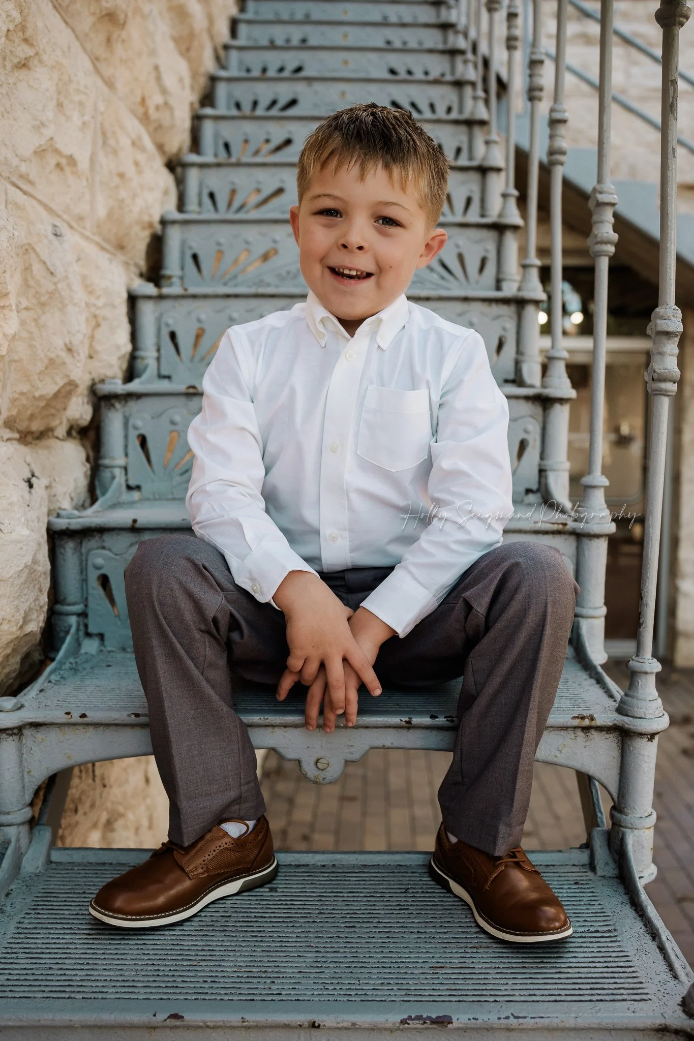 Birthday photos o the stairs in the square in Georgetown, Texas