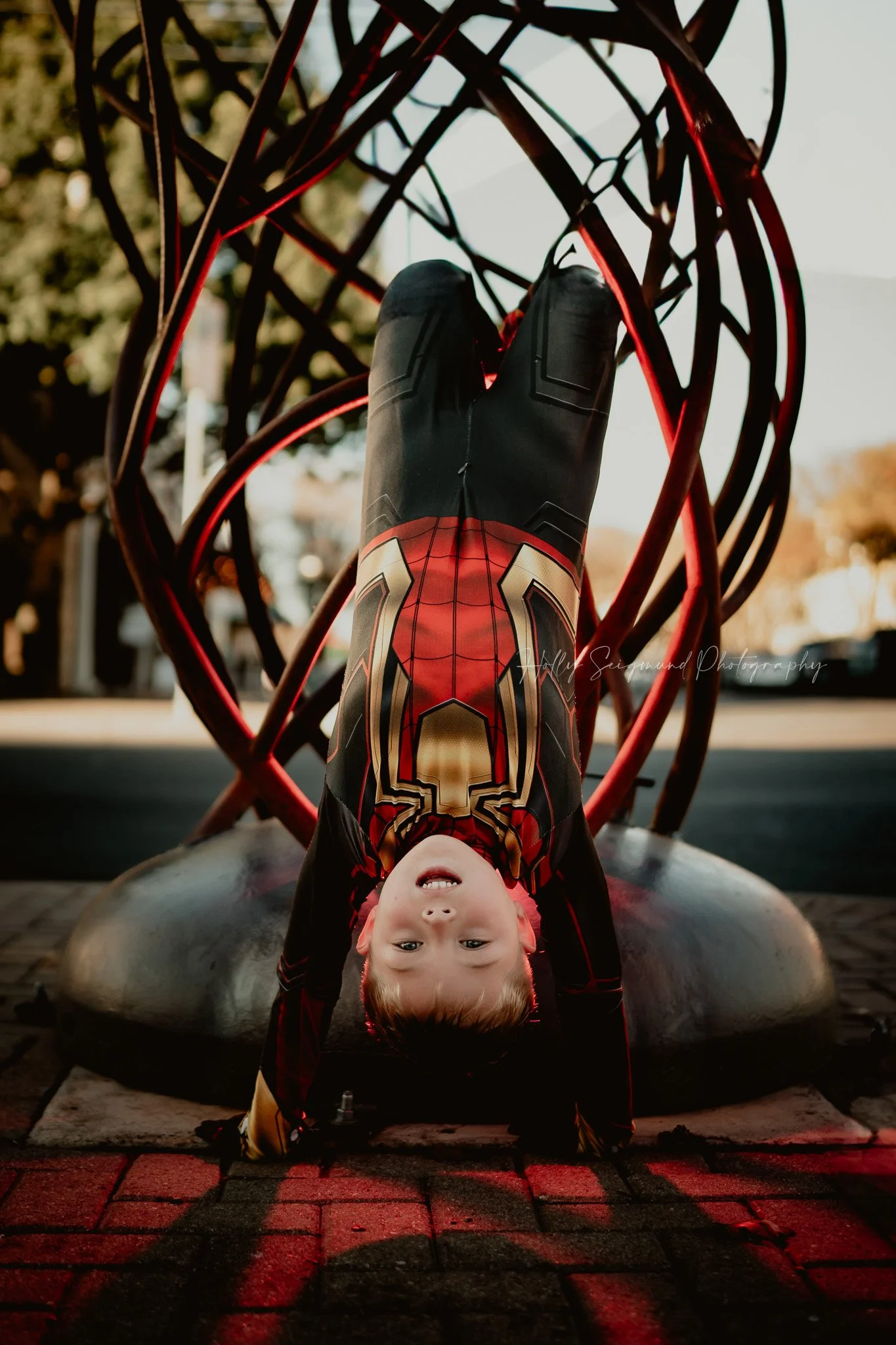 boy dressed as Spiderman photographed for a 6th birthday session in Georgetown Texas